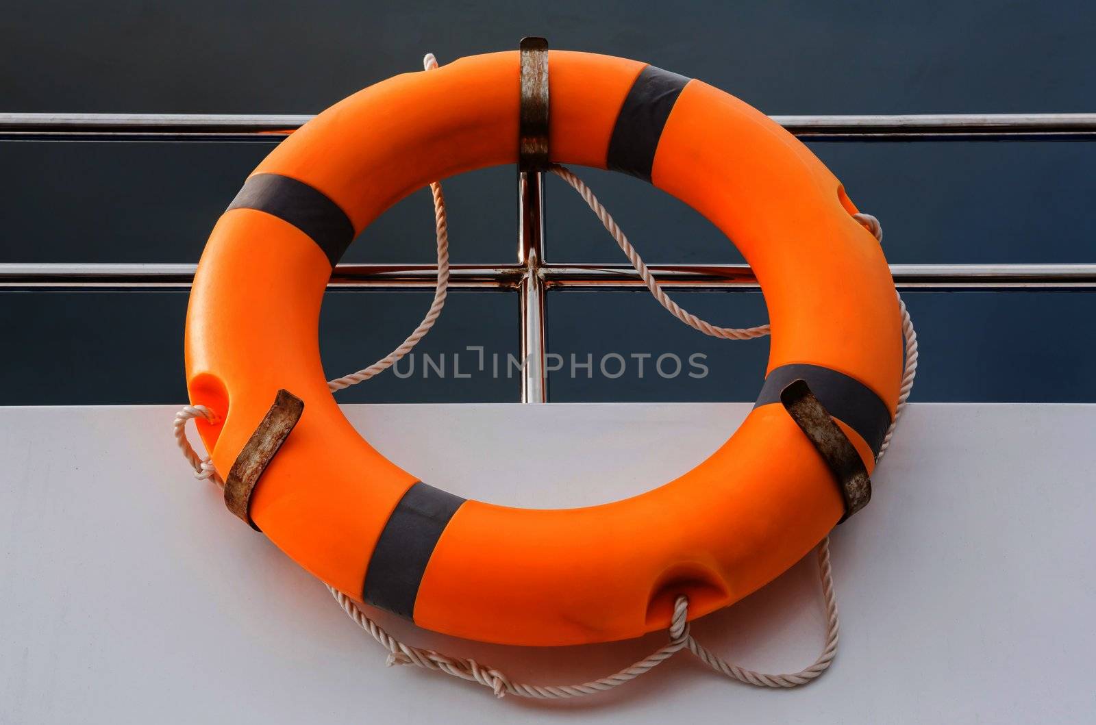Orange life buoy in boat