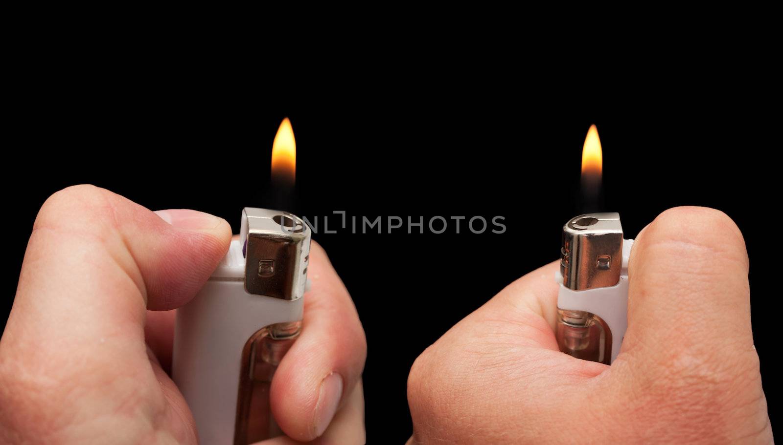 hand with a cigarette lighter on a black background by schankz