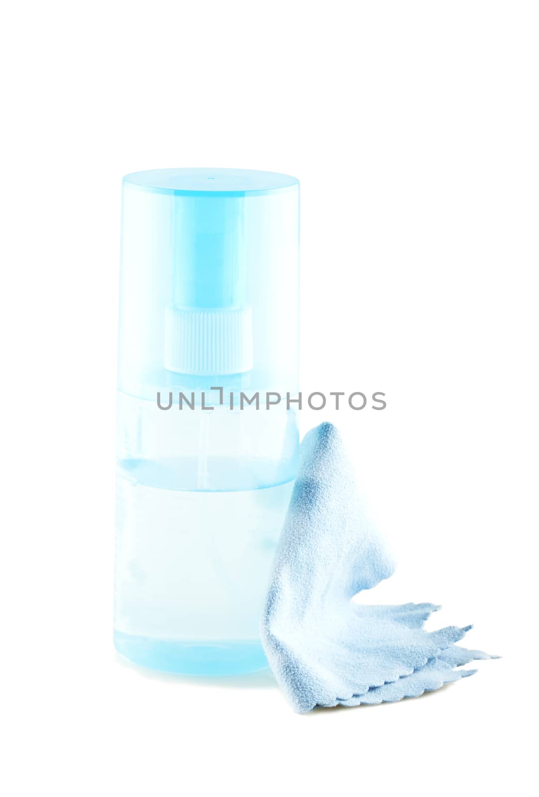 A blue bottle of detergent near a cloth isolated over white background