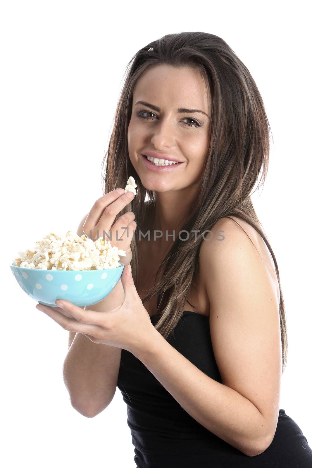 Model Released. Woman Eating Popcorn by Whiteboxmedia