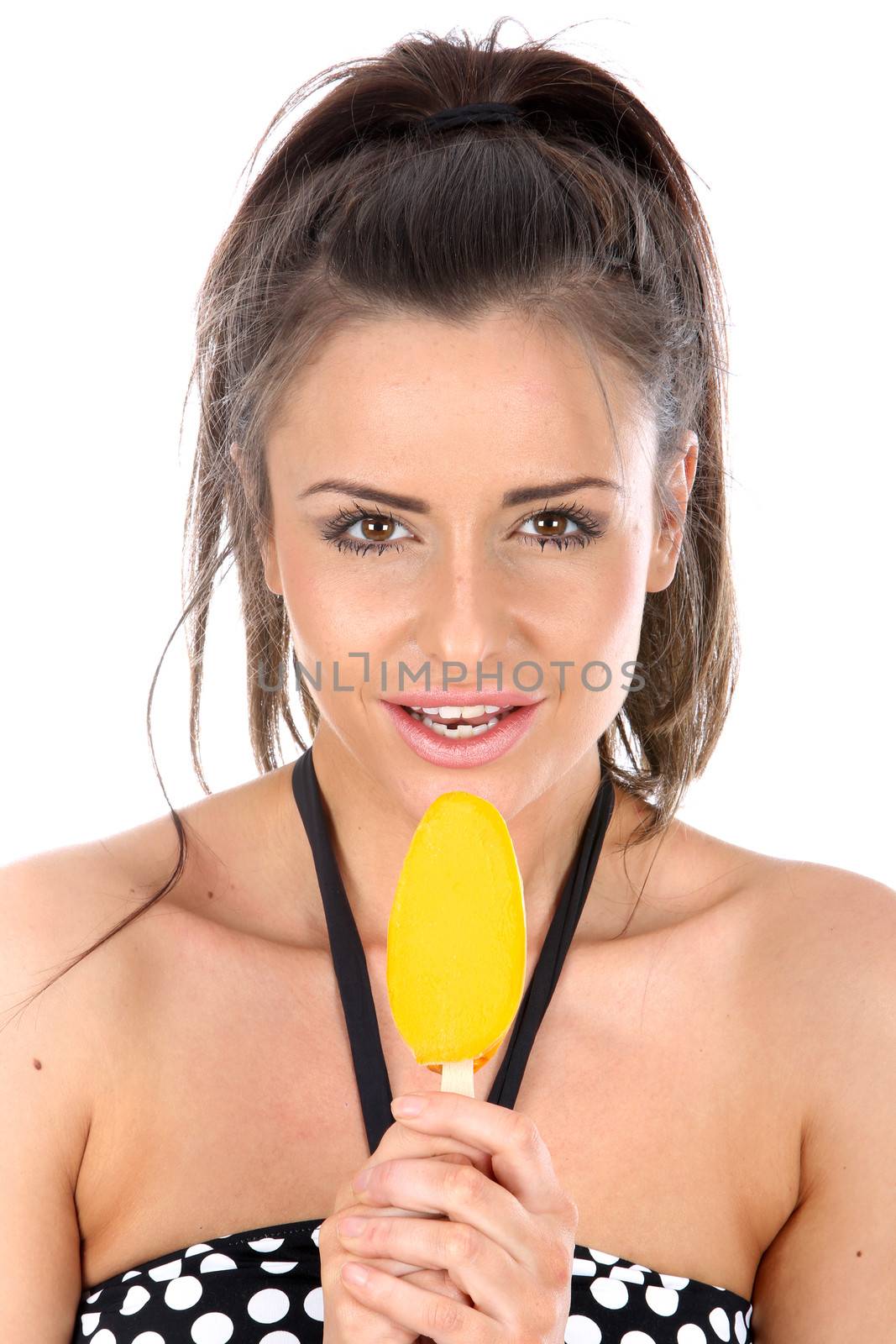 Model Released. Woman Eating Ice lolly
