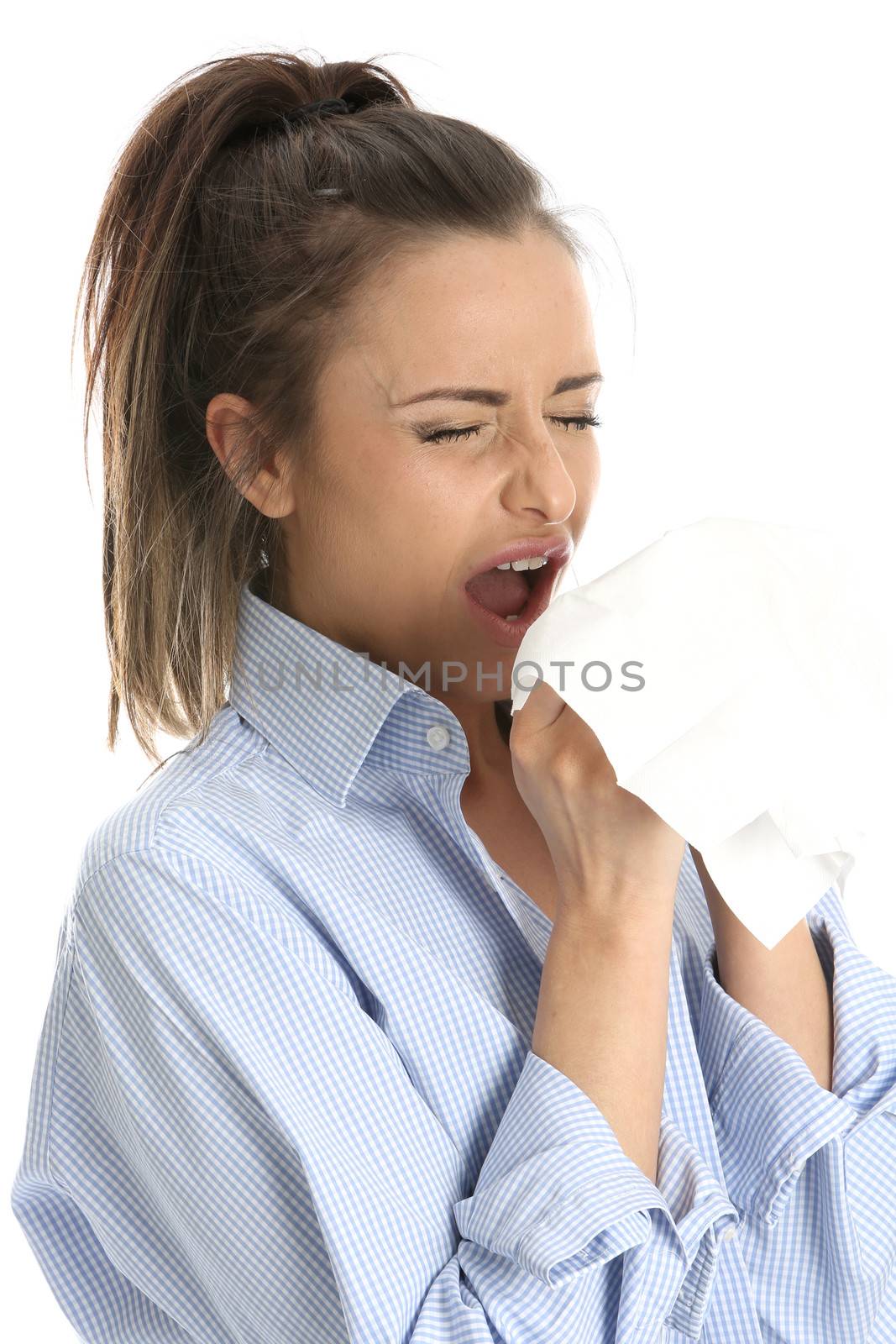 Model Released. Young attractive Woman Sneezing isolated white background