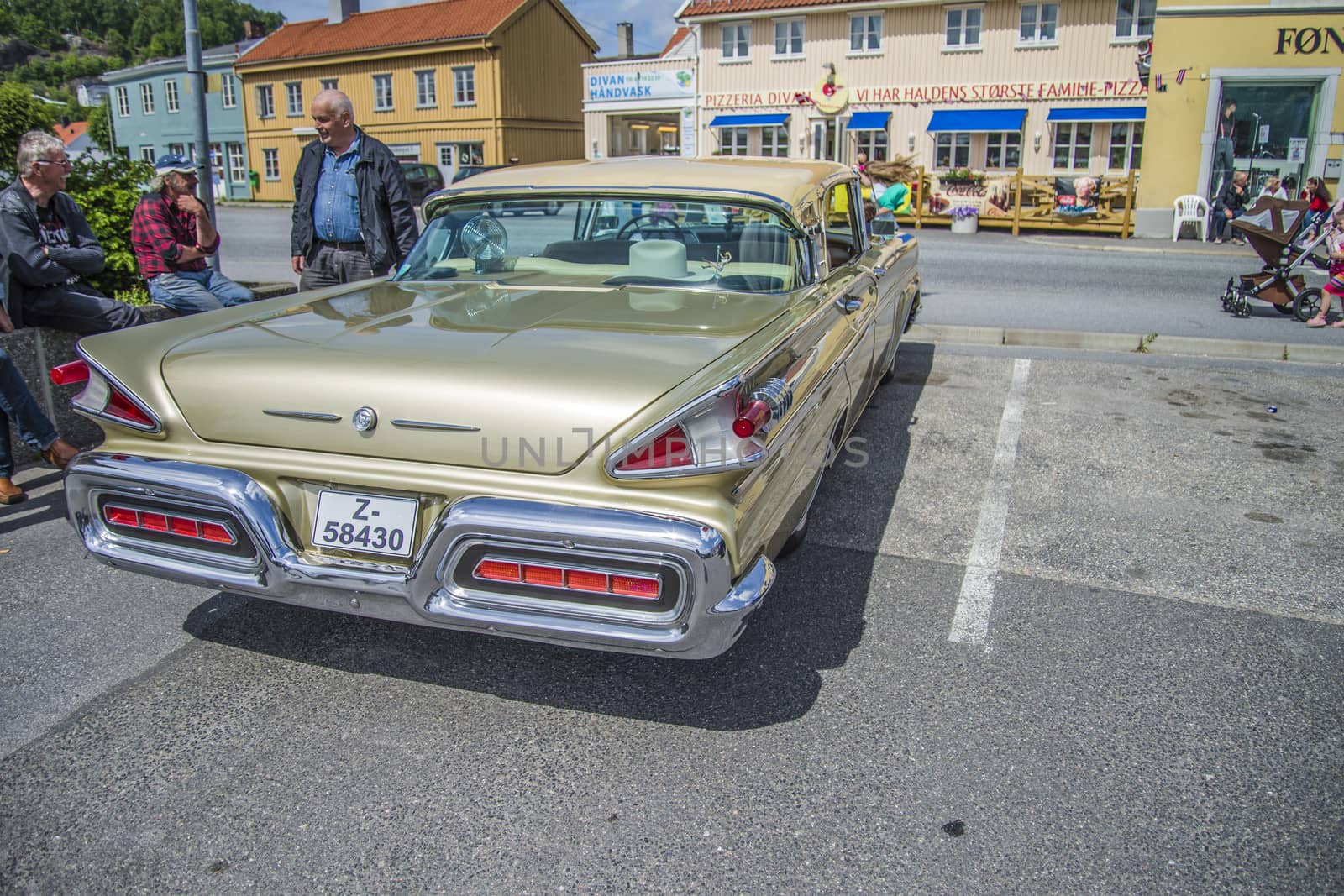 Beautifully restored classic American car. The photo is shot at the fish market in Halden, Norway.