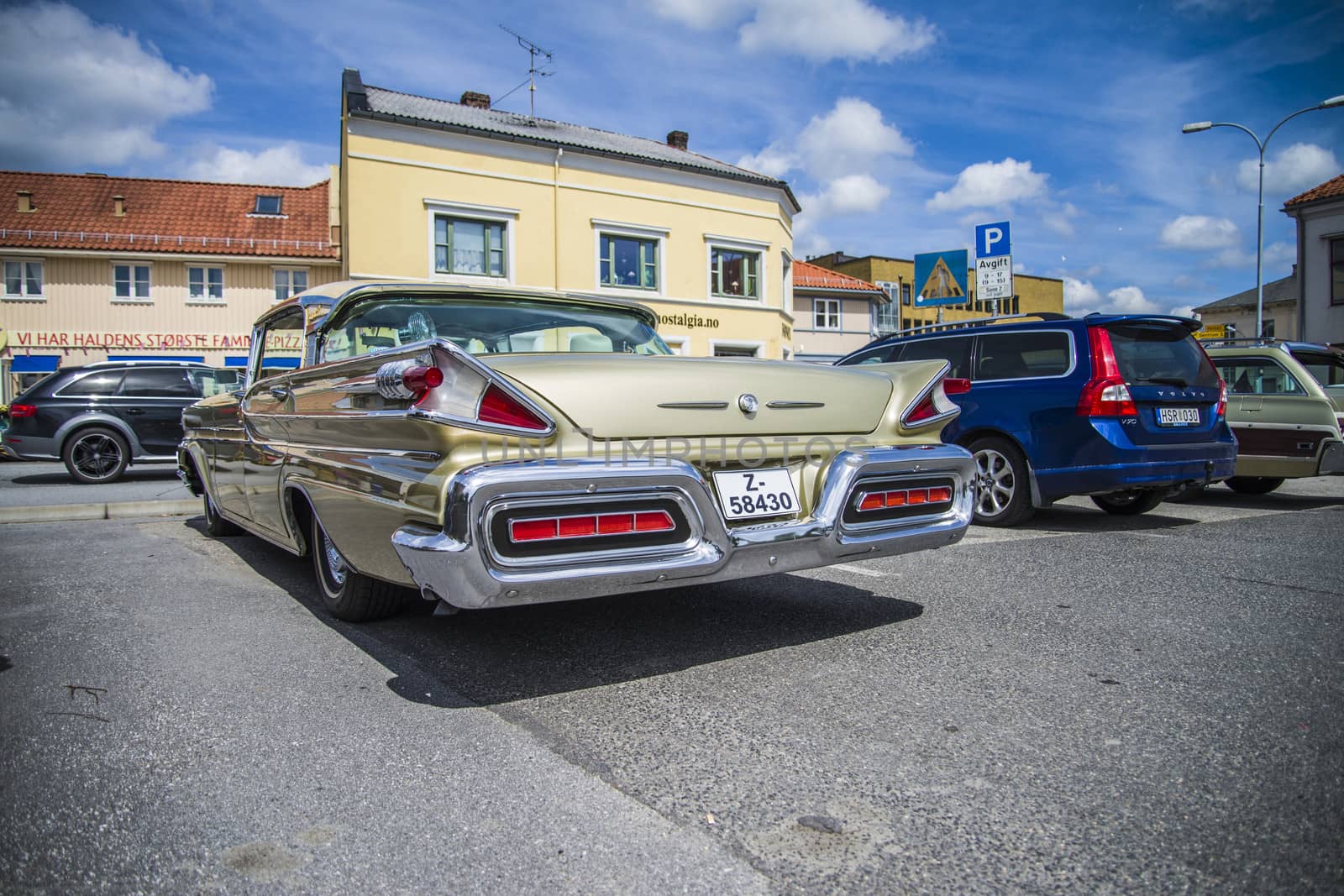 Beautifully restored classic American car. The photo is shot at the fish market in Halden, Norway.