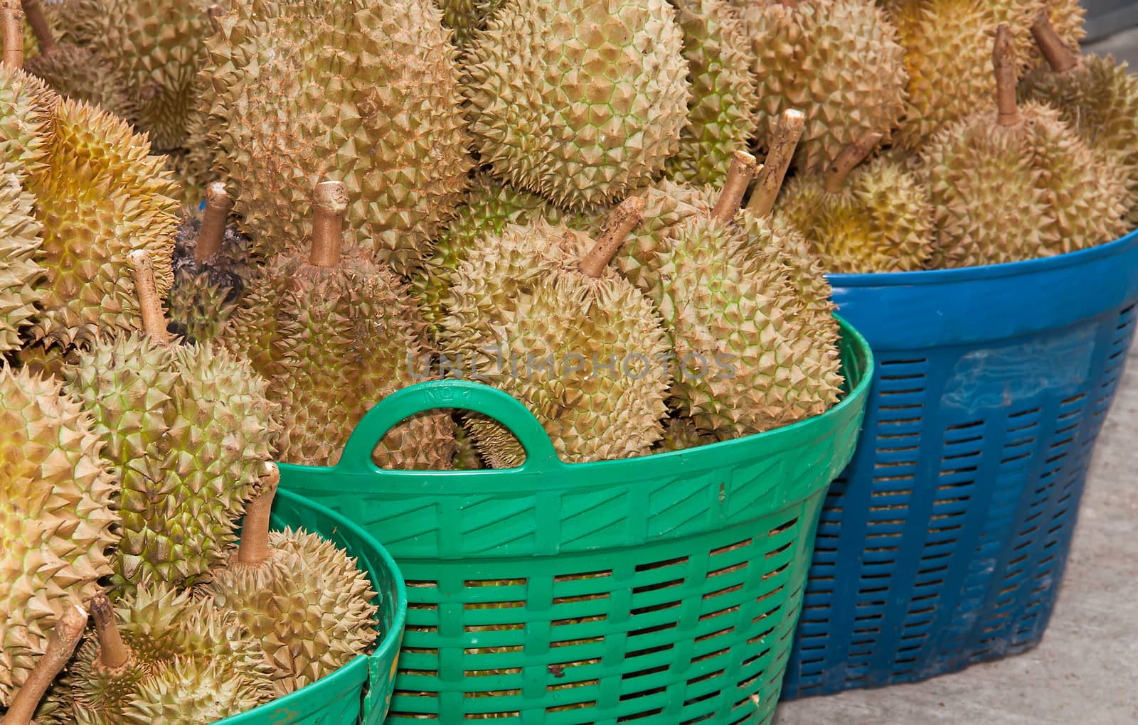 pile of durian In the basket for sale in local market in thailand