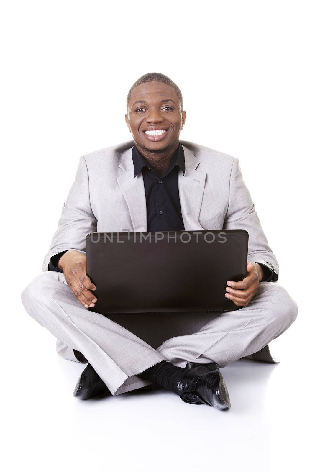 Successful businessman working on laptop by BDS