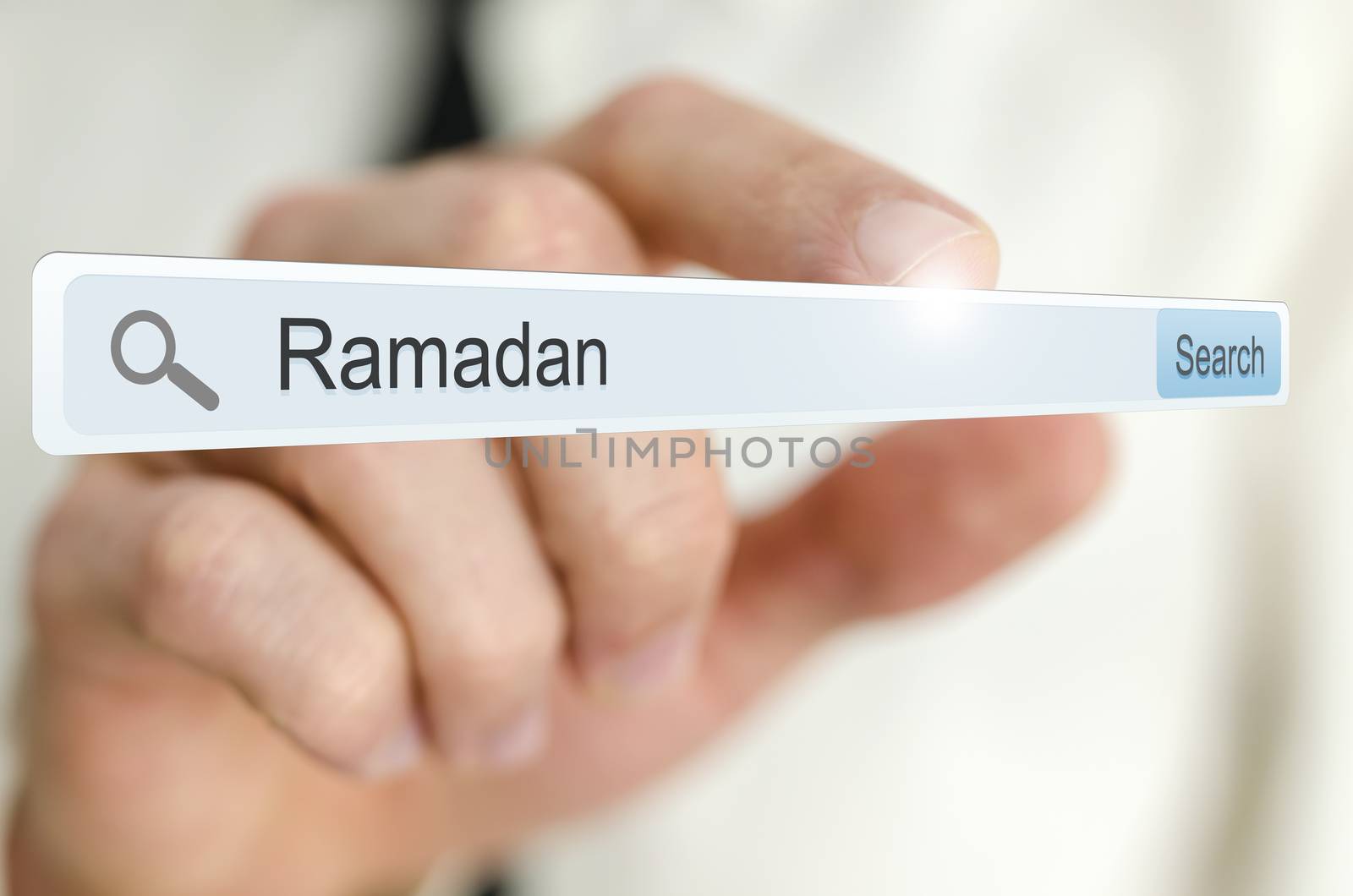 Word Ramadan written in search bar on virtual screen.