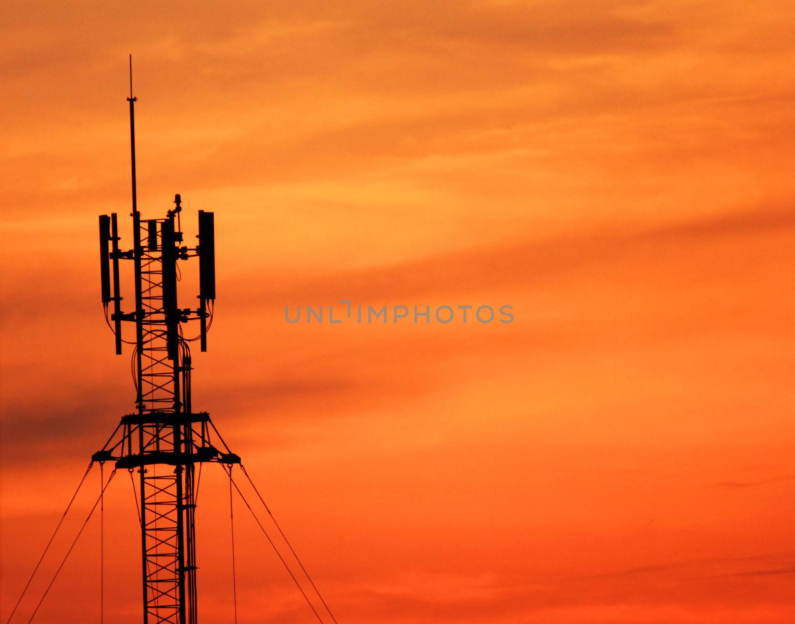 Antenna tower of communication with sunset