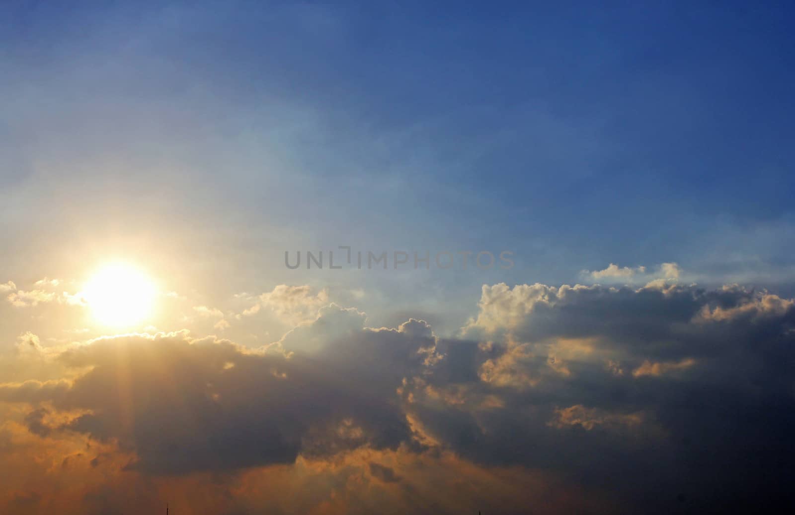 Dramatic sky with clouds and sun by nuchylee