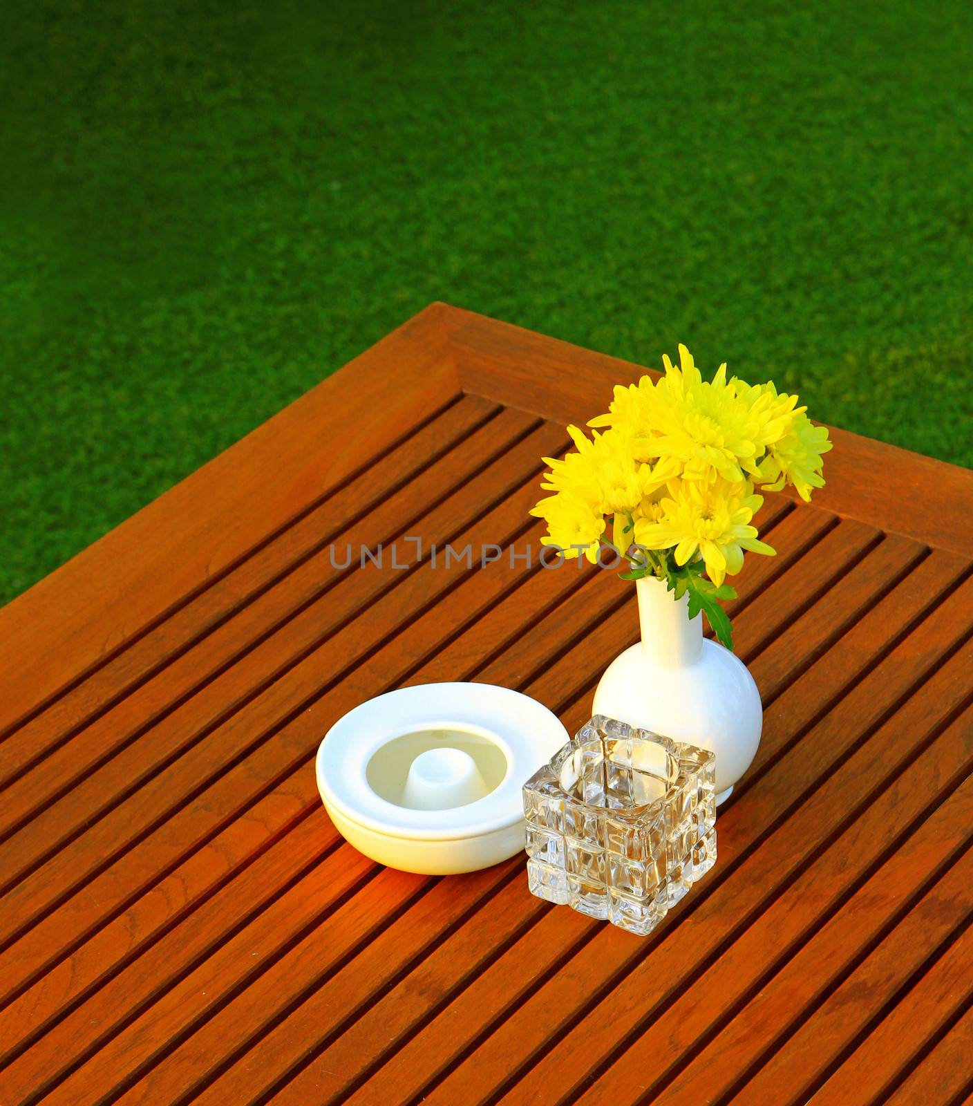 Table setting with flower in outdoor restaurant by nuchylee