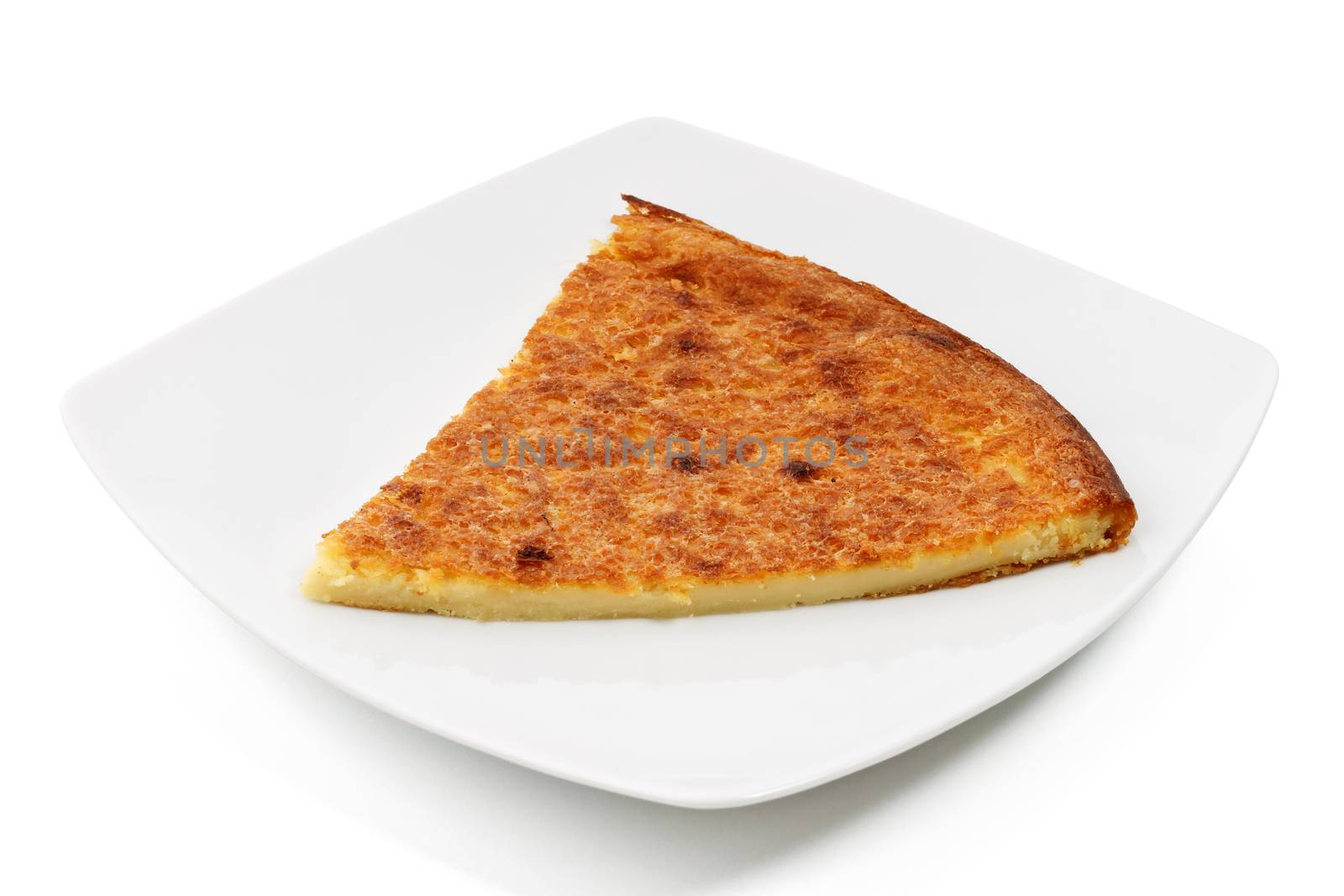 plate with italian farinata baked with chickpea flour over white background with clipping path