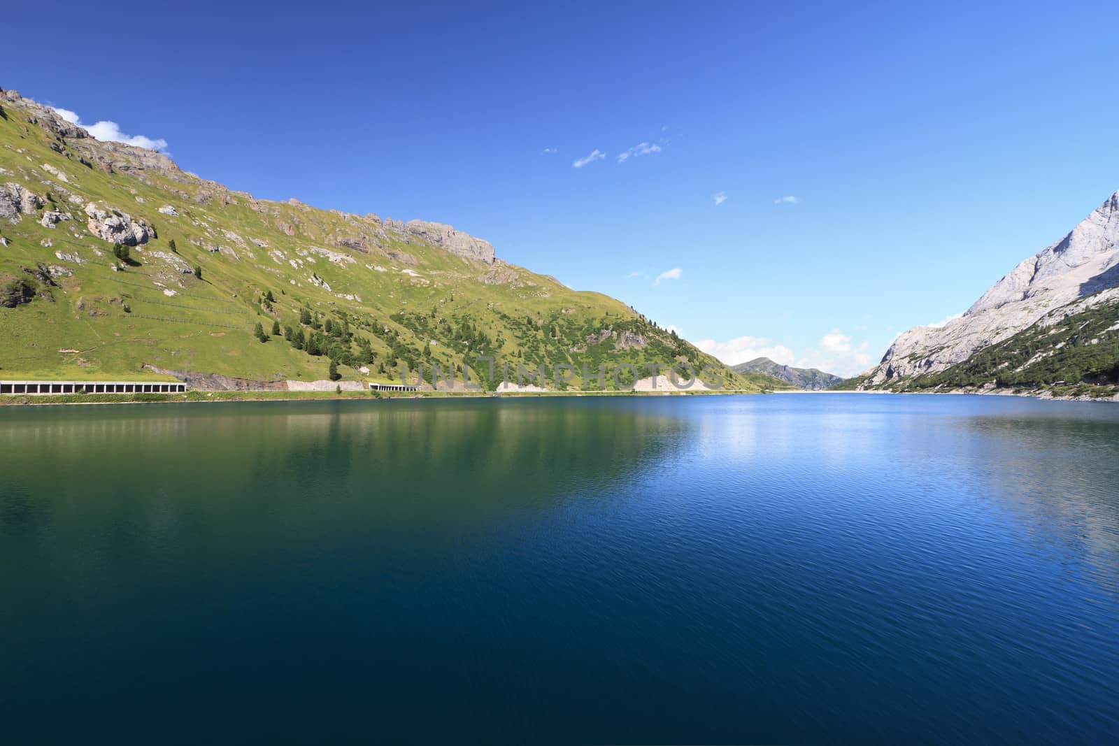 summer landscape of Fedaia lake and pass, Trentino, Italy