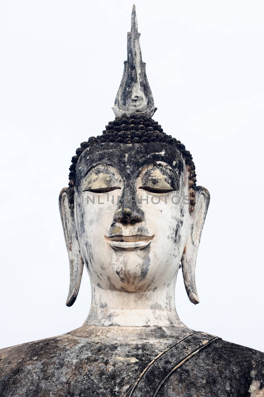 Statue of a deity in the Historical Park of Sukhothai, Thailand