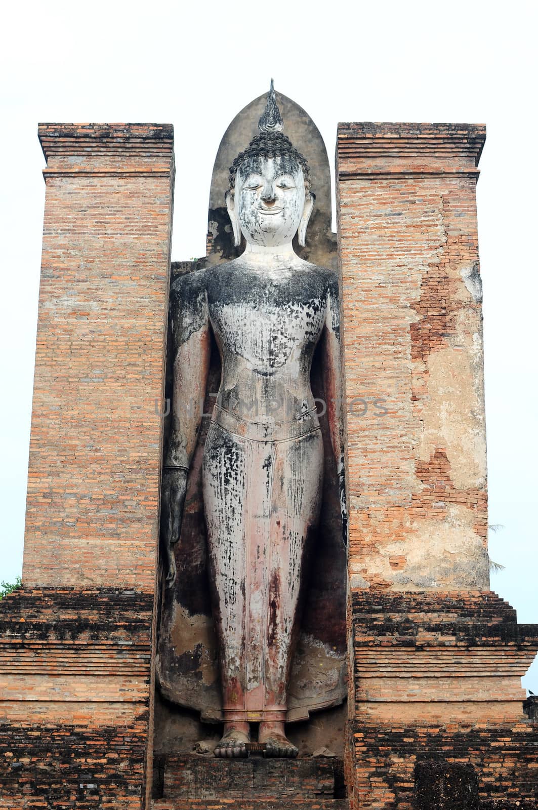Statue of a deity in the Historical Park of Sukhothai, Thailand