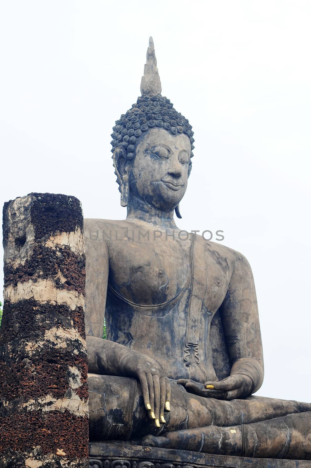 Statue of a deity in the Historical Park of Sukhothai, Thailand