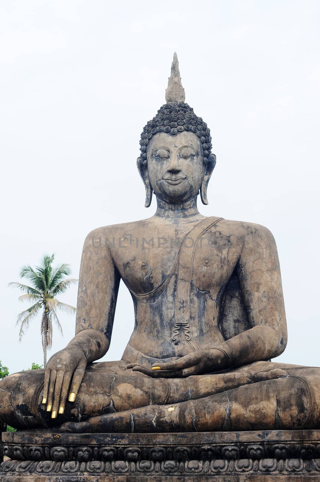 Statue of a deity in the Historical Park of Sukhothai, Thailand