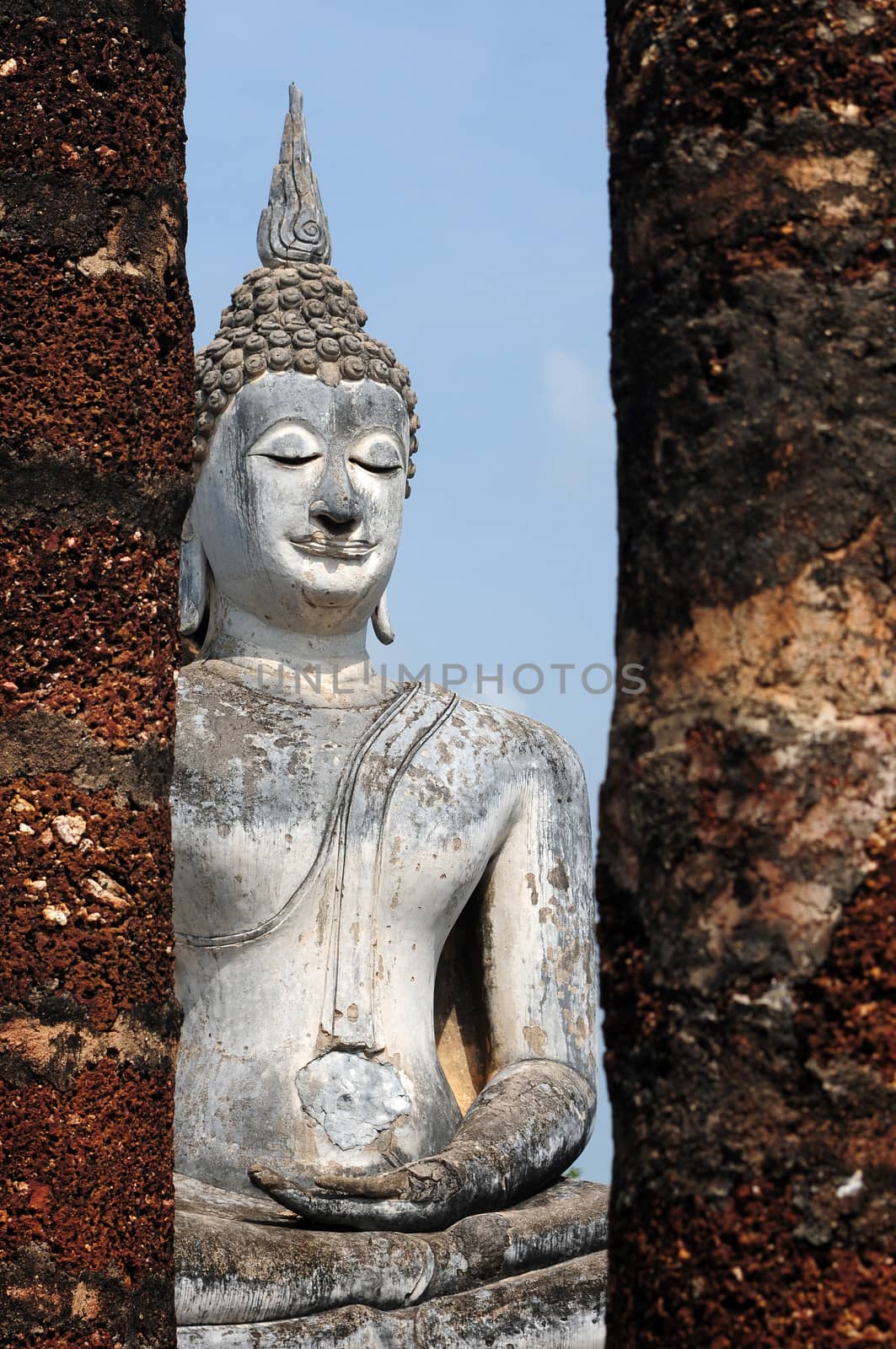 Statue of a deity in the Historical Park of Sukhothai, Thailand