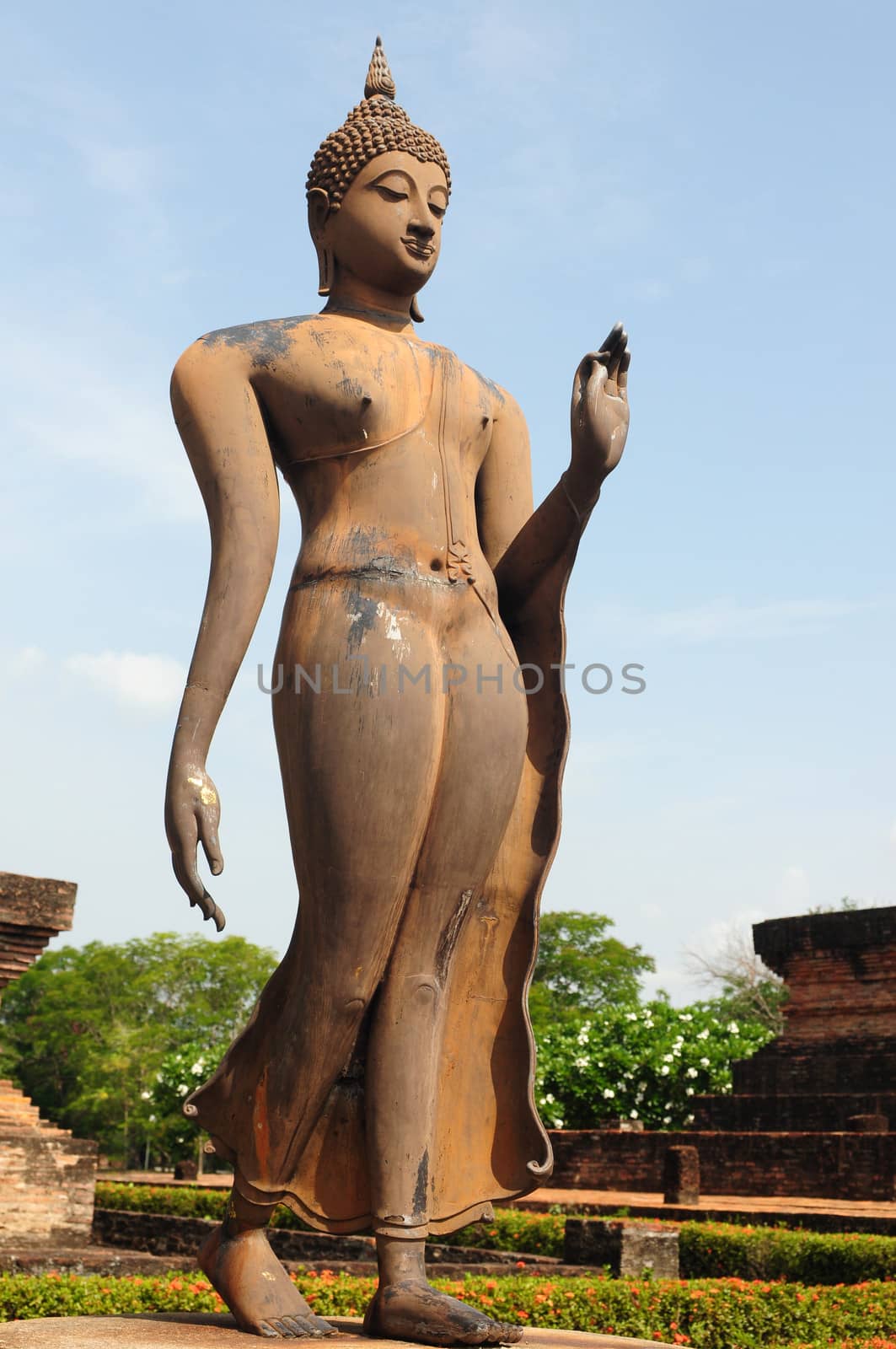 Statue of a deity in the Historical Park of Sukhothai, Thailand