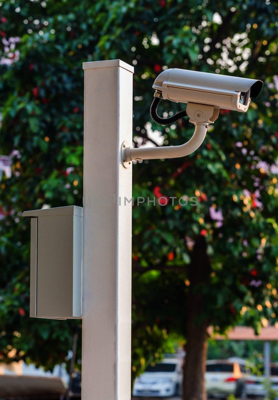 White CCTV camera watching for security 24 hours