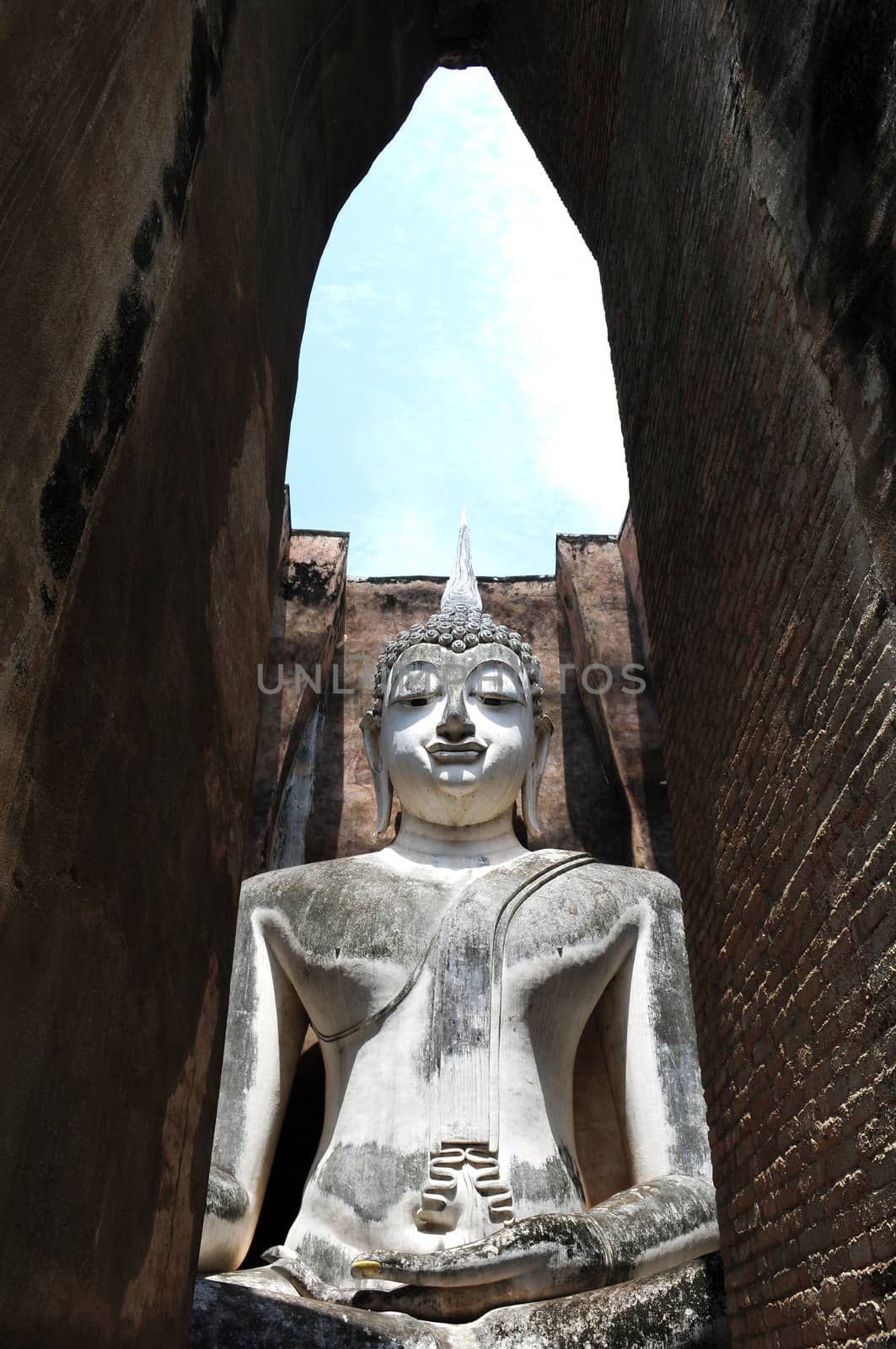 Statue of a deity in the Historical Park of Sukhothai, Thailand