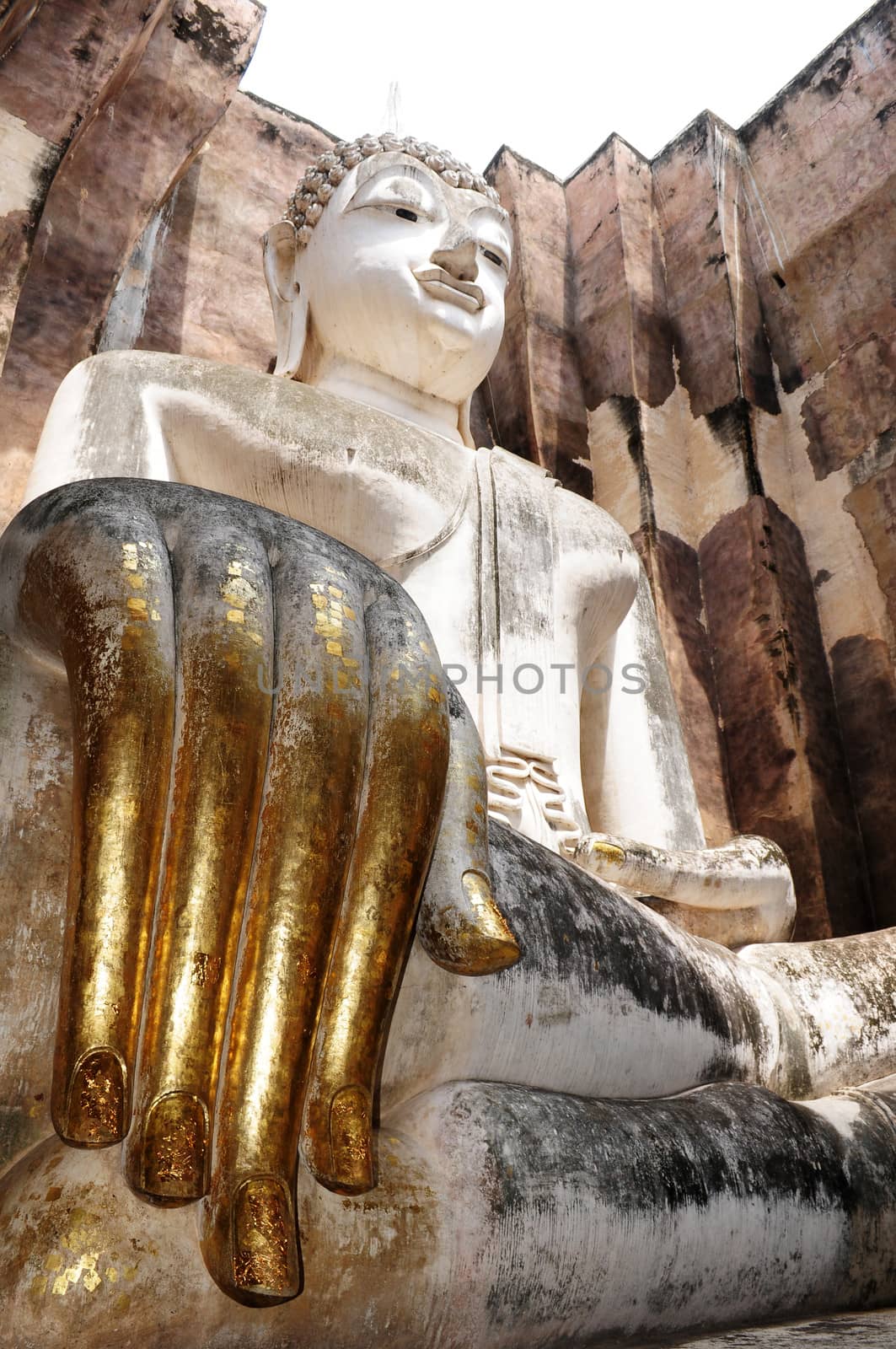 Statue of a deity in the Historical Park of Sukhothai, Thailand