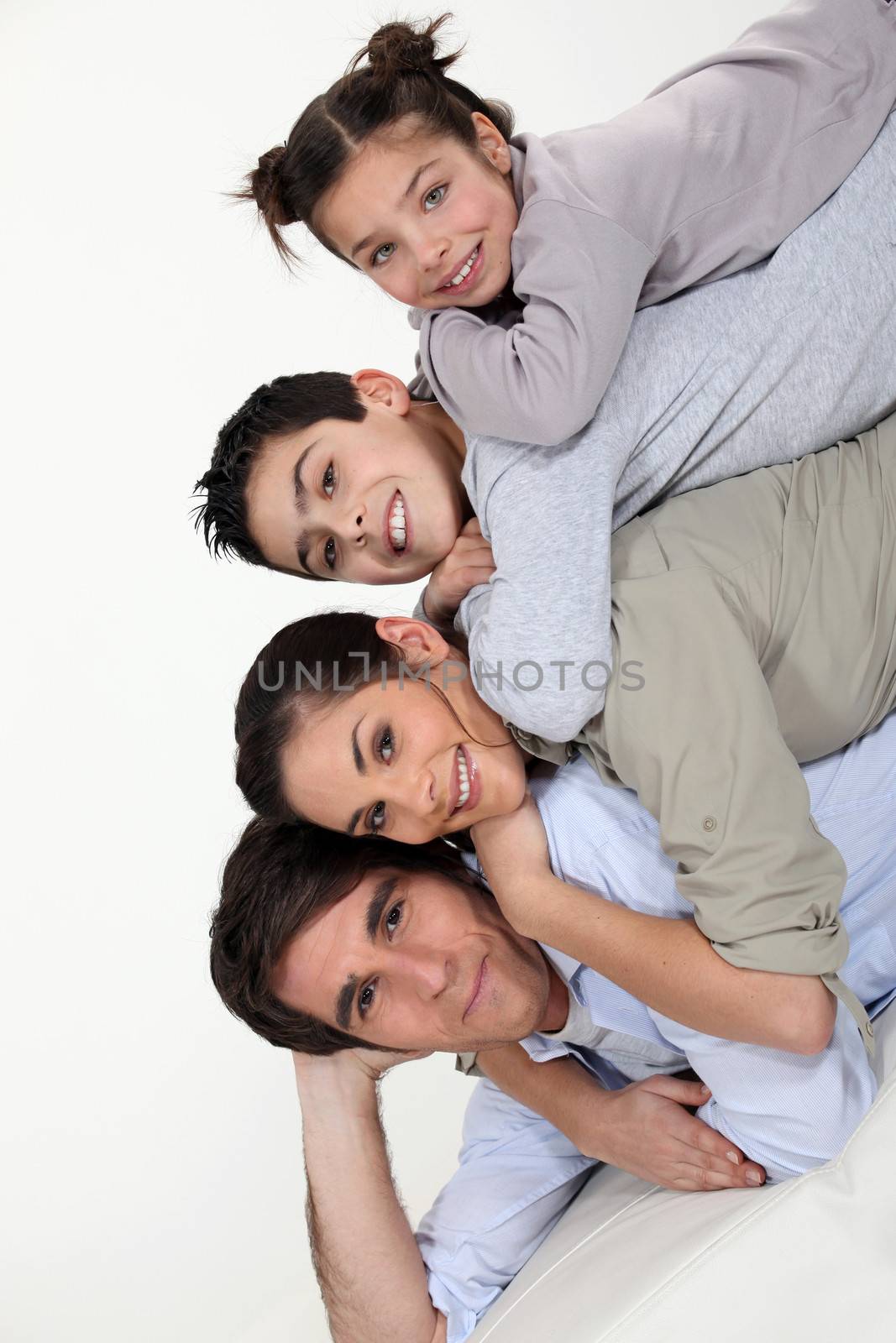 Portrait of happy family, studio shot