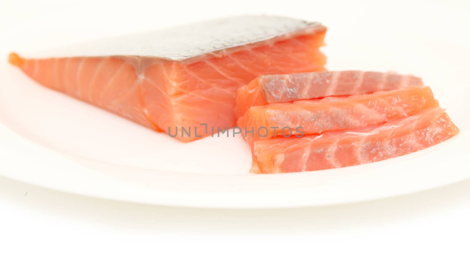 piece of red fish fillet isolated on white 