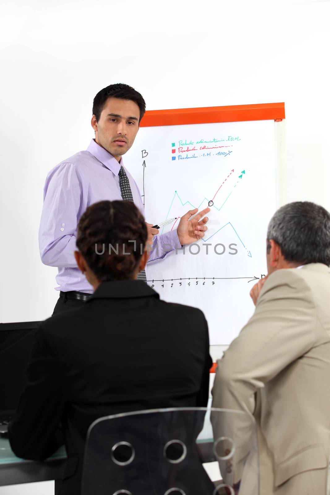 Businessman making presentation by phovoir