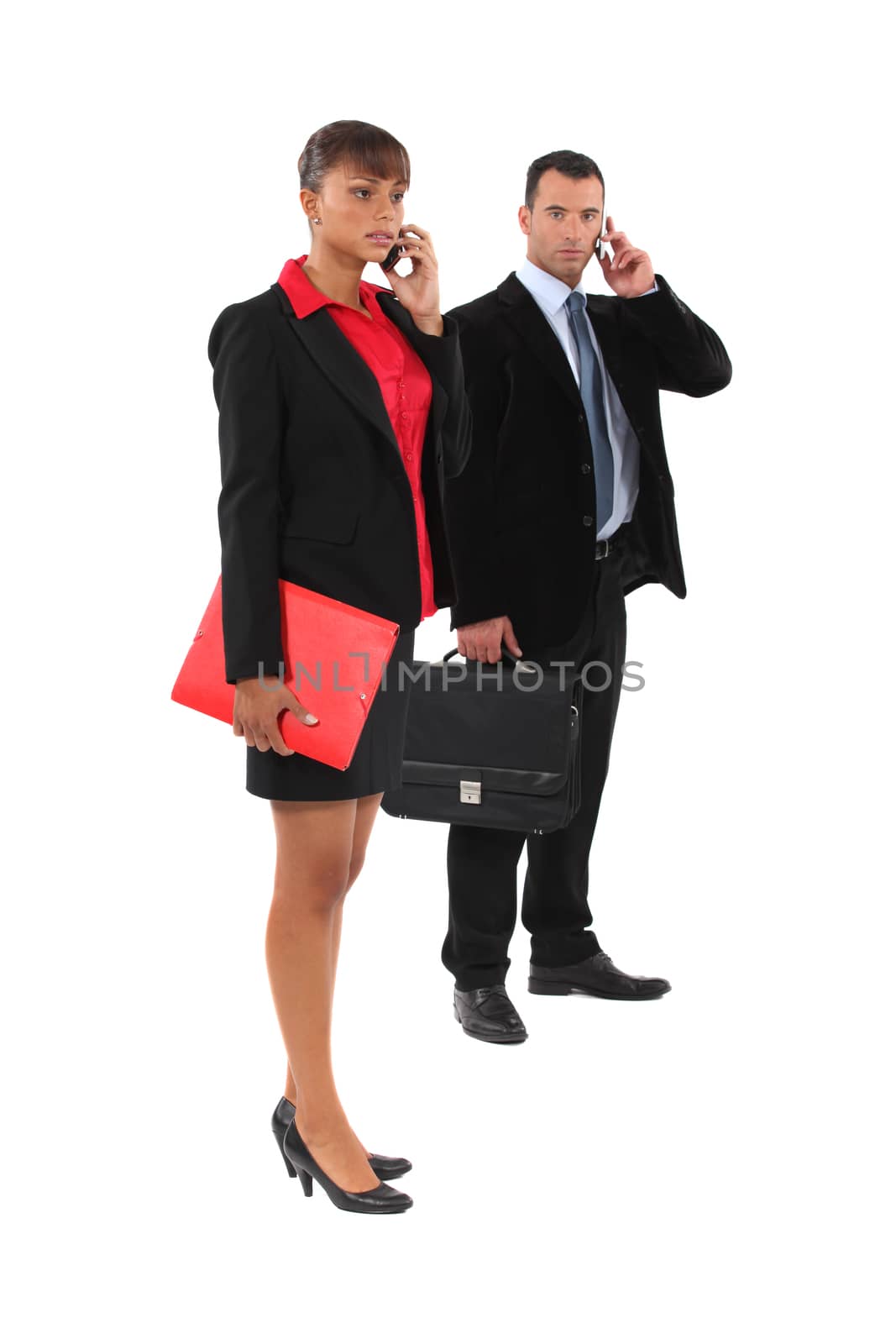 Couple of executives at the phone