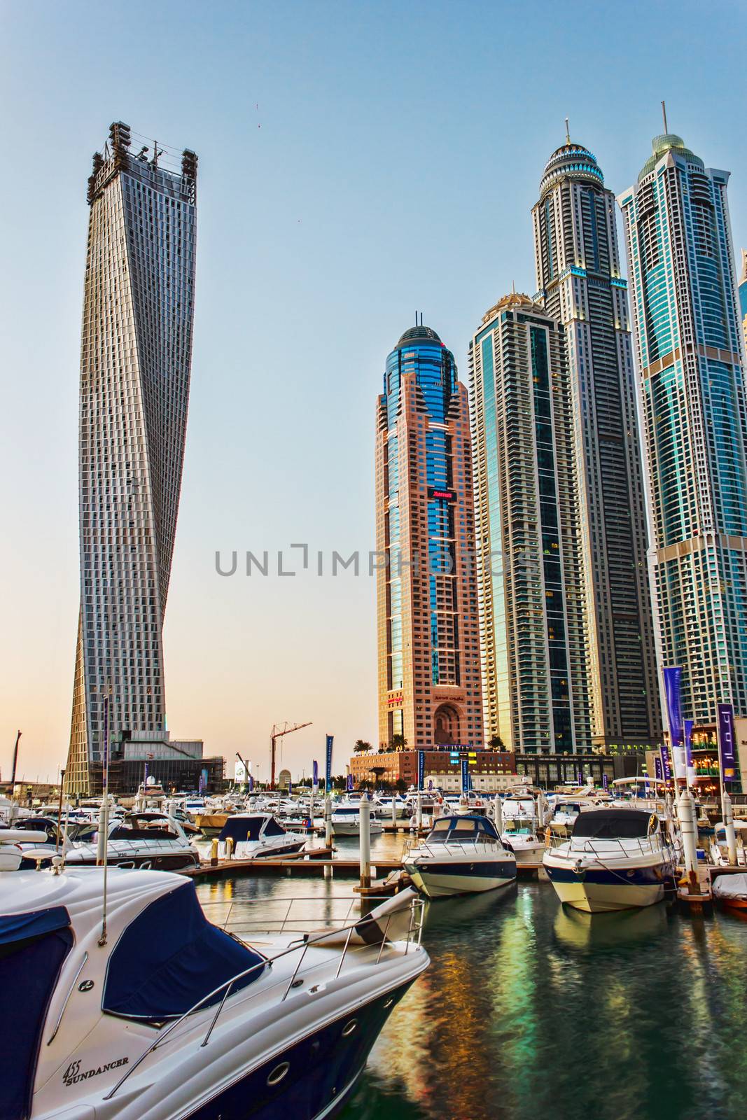 DUBAI, UAE - NOVEMBER 16: Yacht Club in Dubai Marina. UAE. November 16, 2012. Dubai was the fastest developing city in the world between 2002 and 2008.