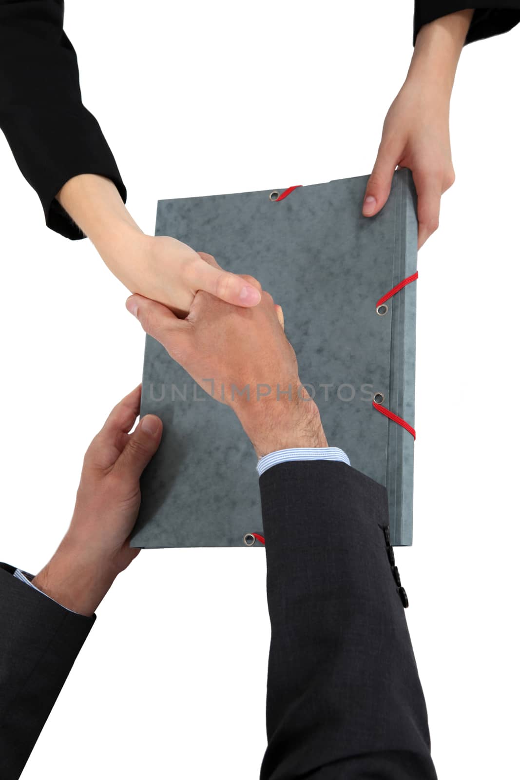 Two businesspeople shaking hands by phovoir