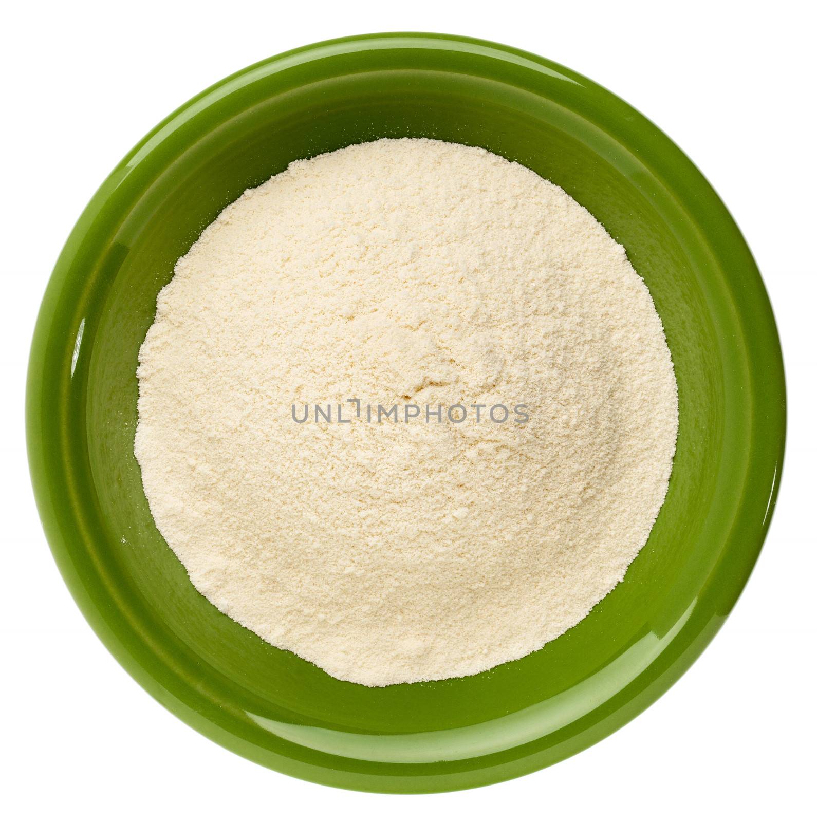 whey protein powder in a small ceramic bowl isolated on white