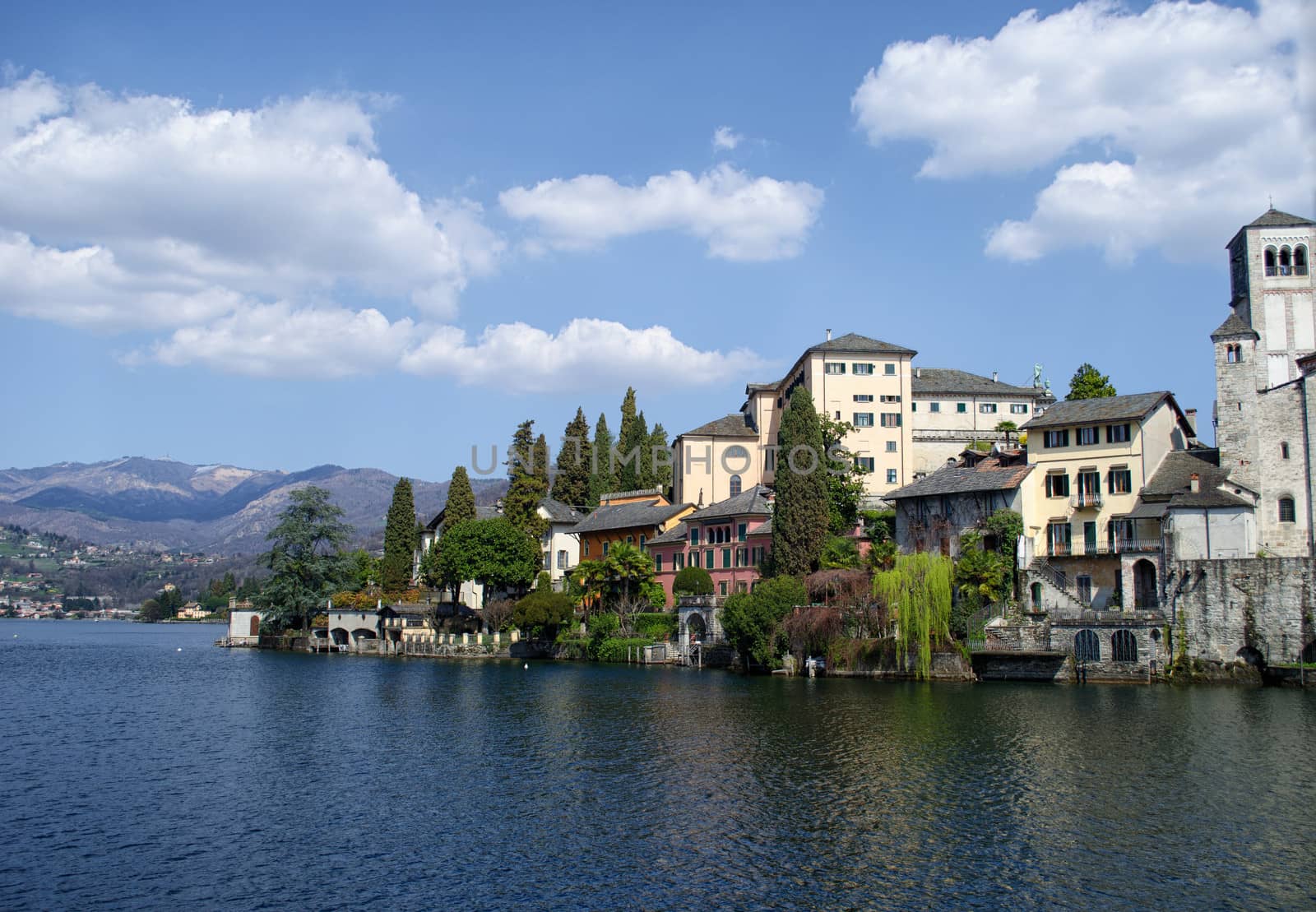 View of San Giulio island on Lake Orta in Italy by artofphoto