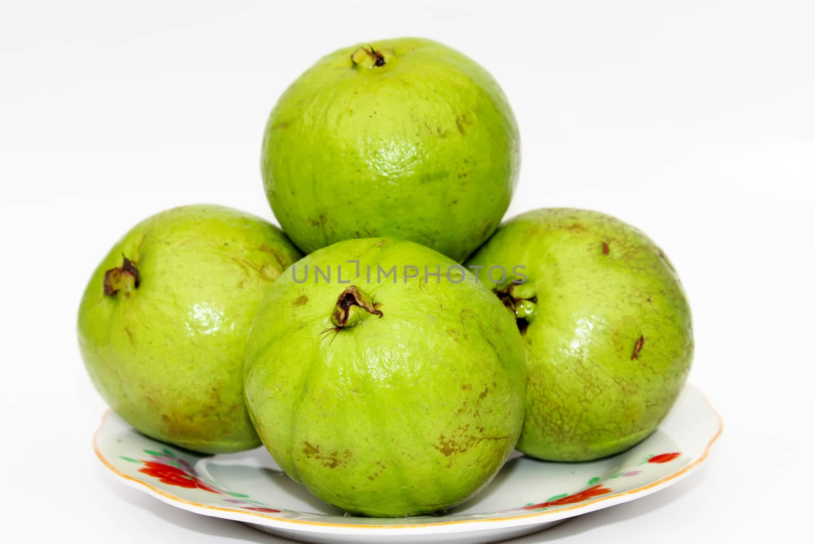 Whole fresh guava fruit on white background 