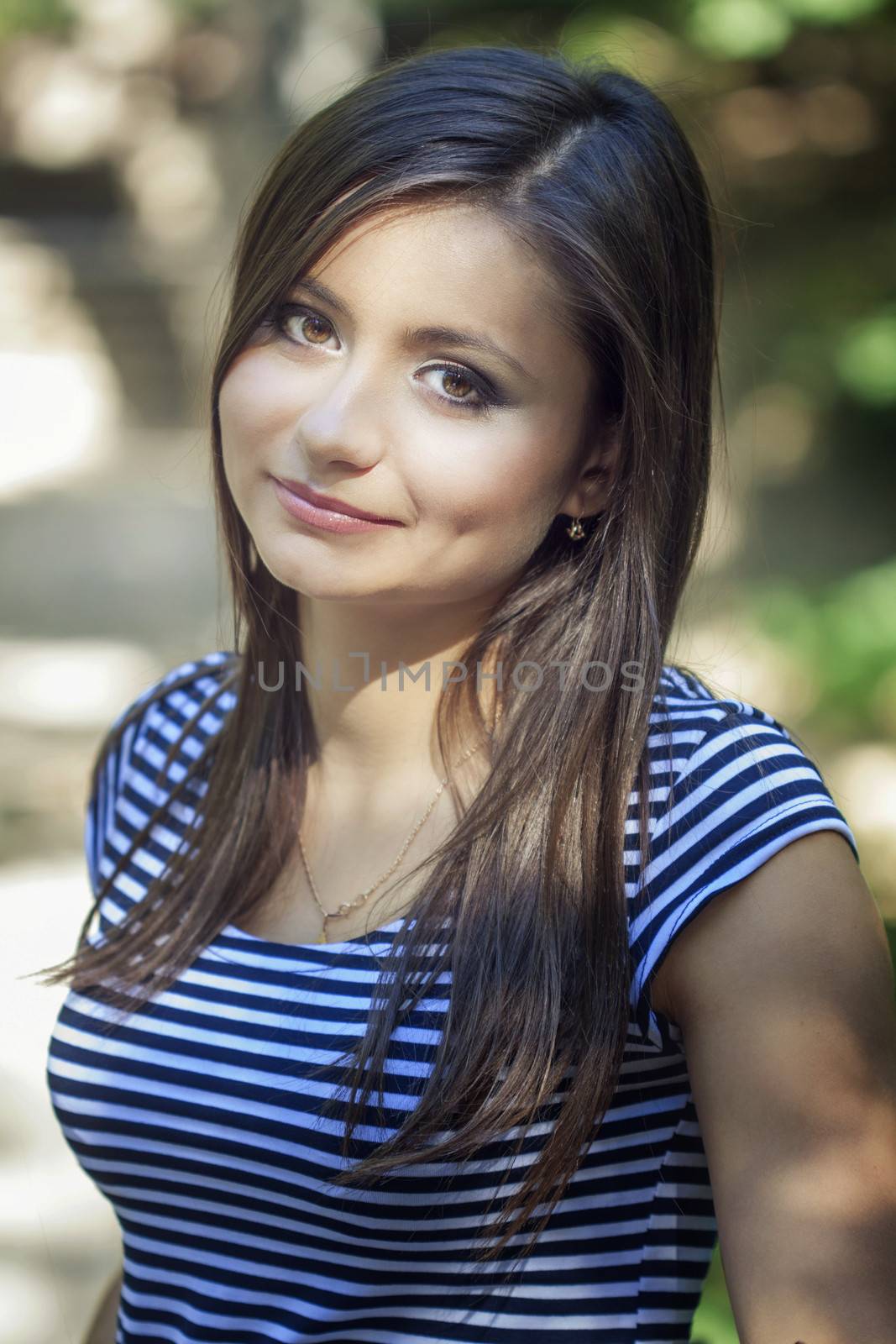 a close up portrait of a brunette beautiful girl 