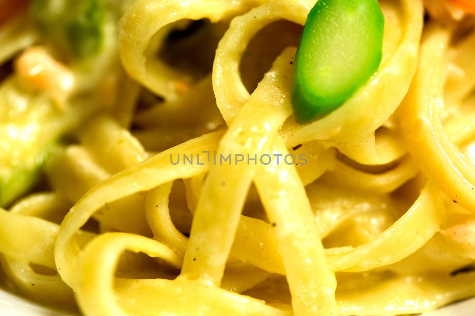 Pasta fettuccine served with fresh vegetables