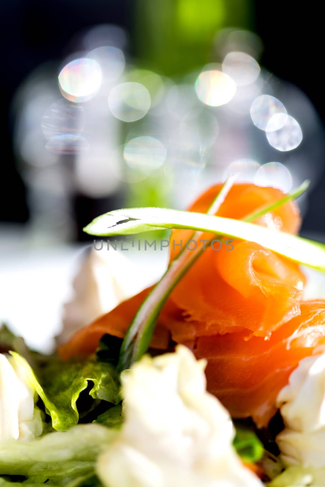 Closeup of smoked salmon salad by stockyimages