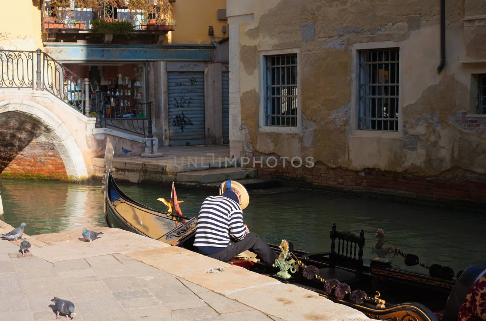 Resting gondolier in Venice, Italy