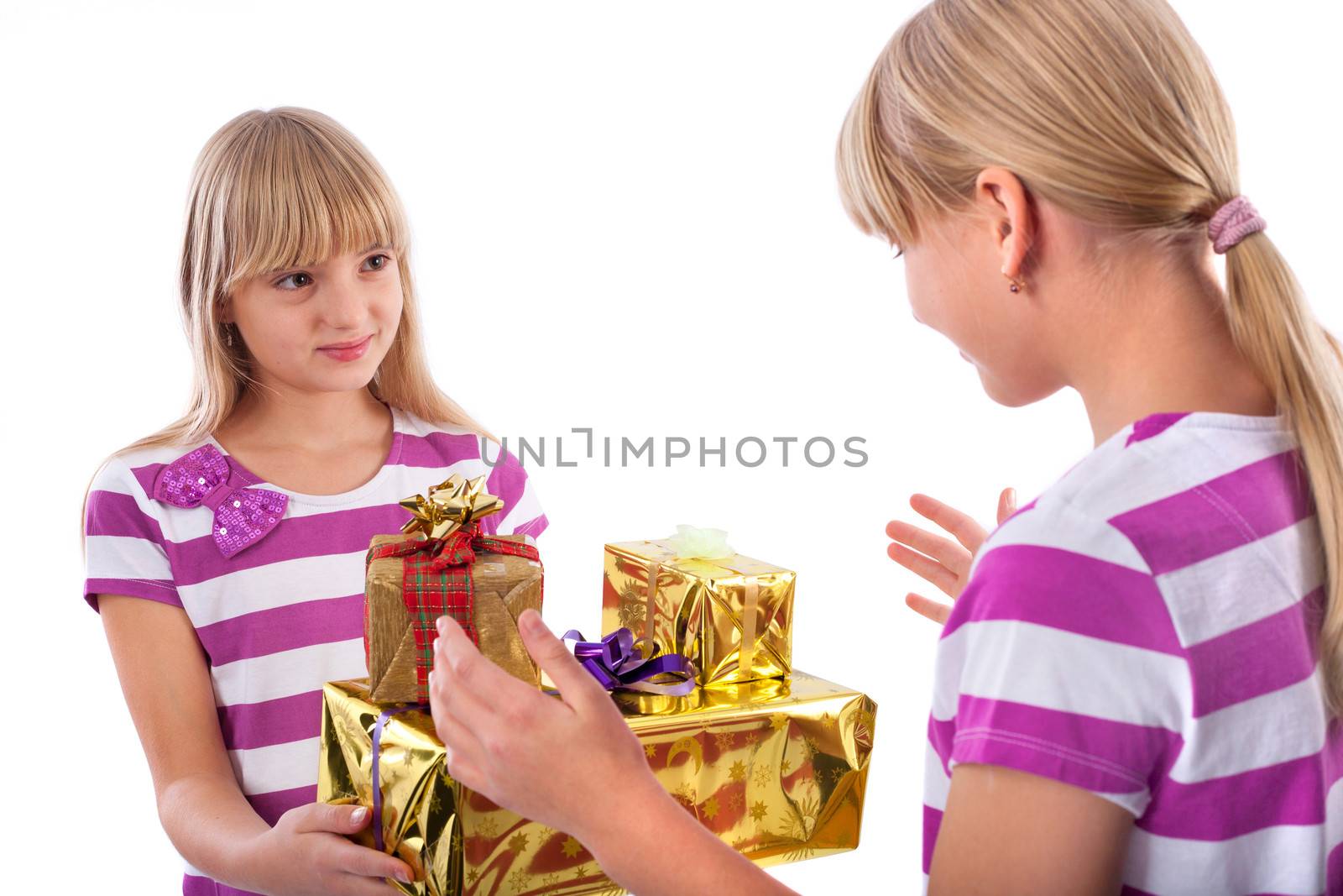 Girl Giving  Gifts to Another Girl