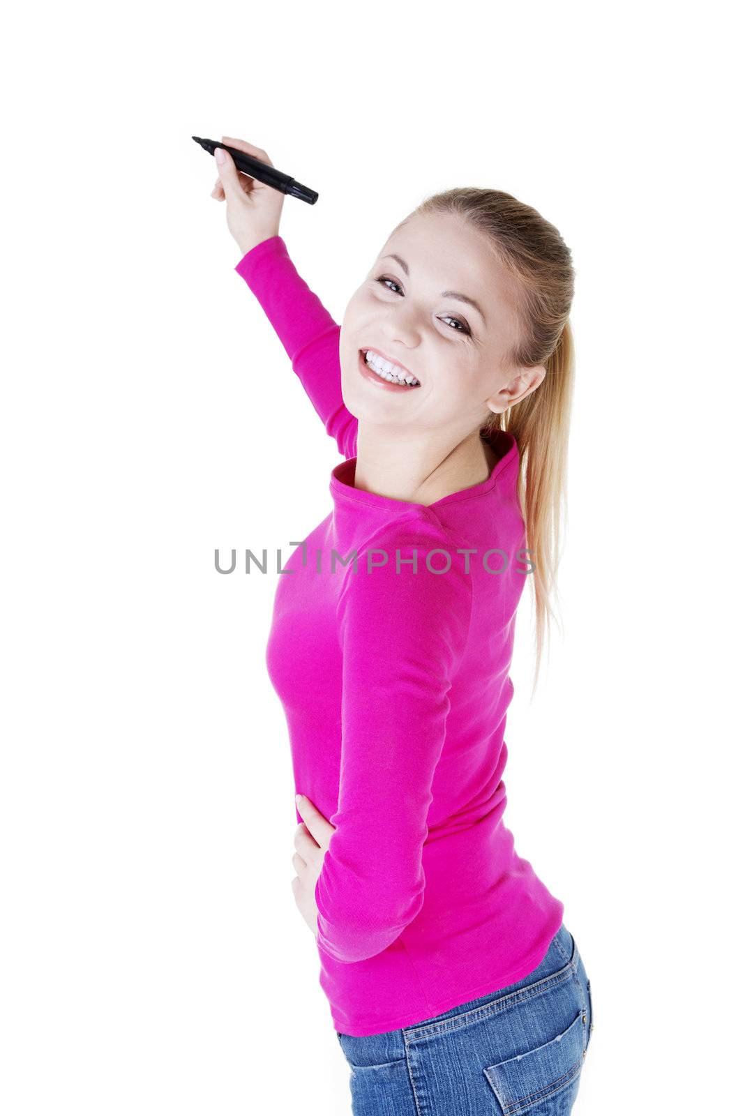 Young student woman writing something on abstract screen with marker