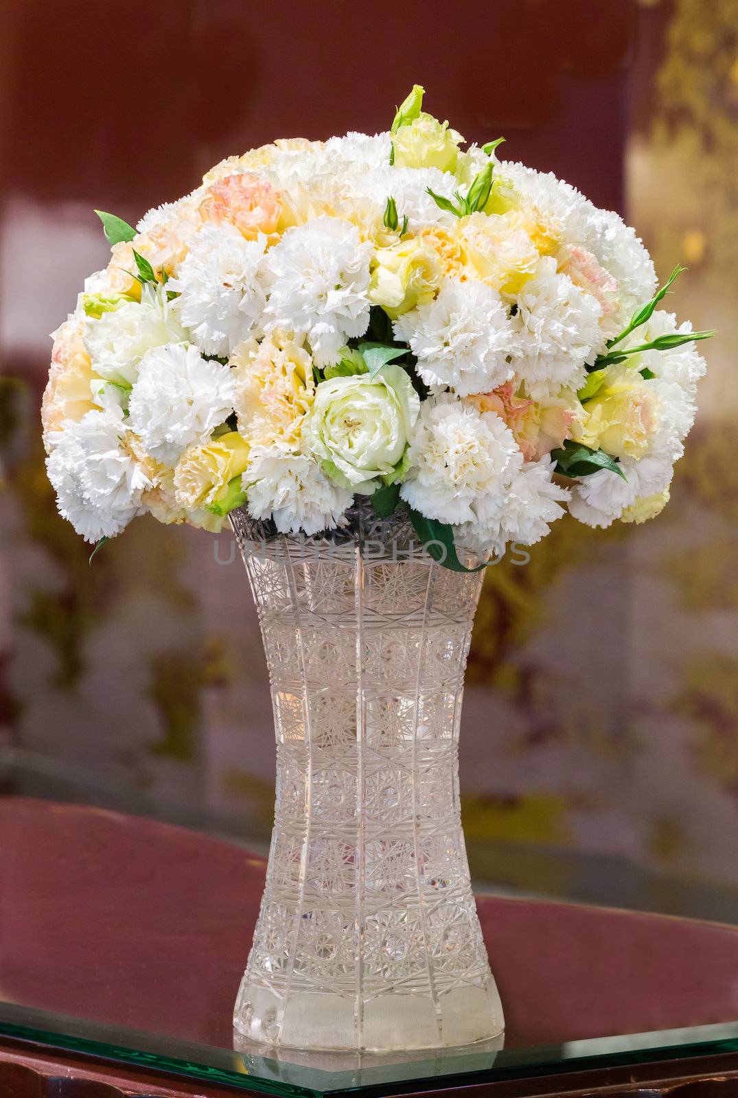 Bunch of carnation flower in crystal vase