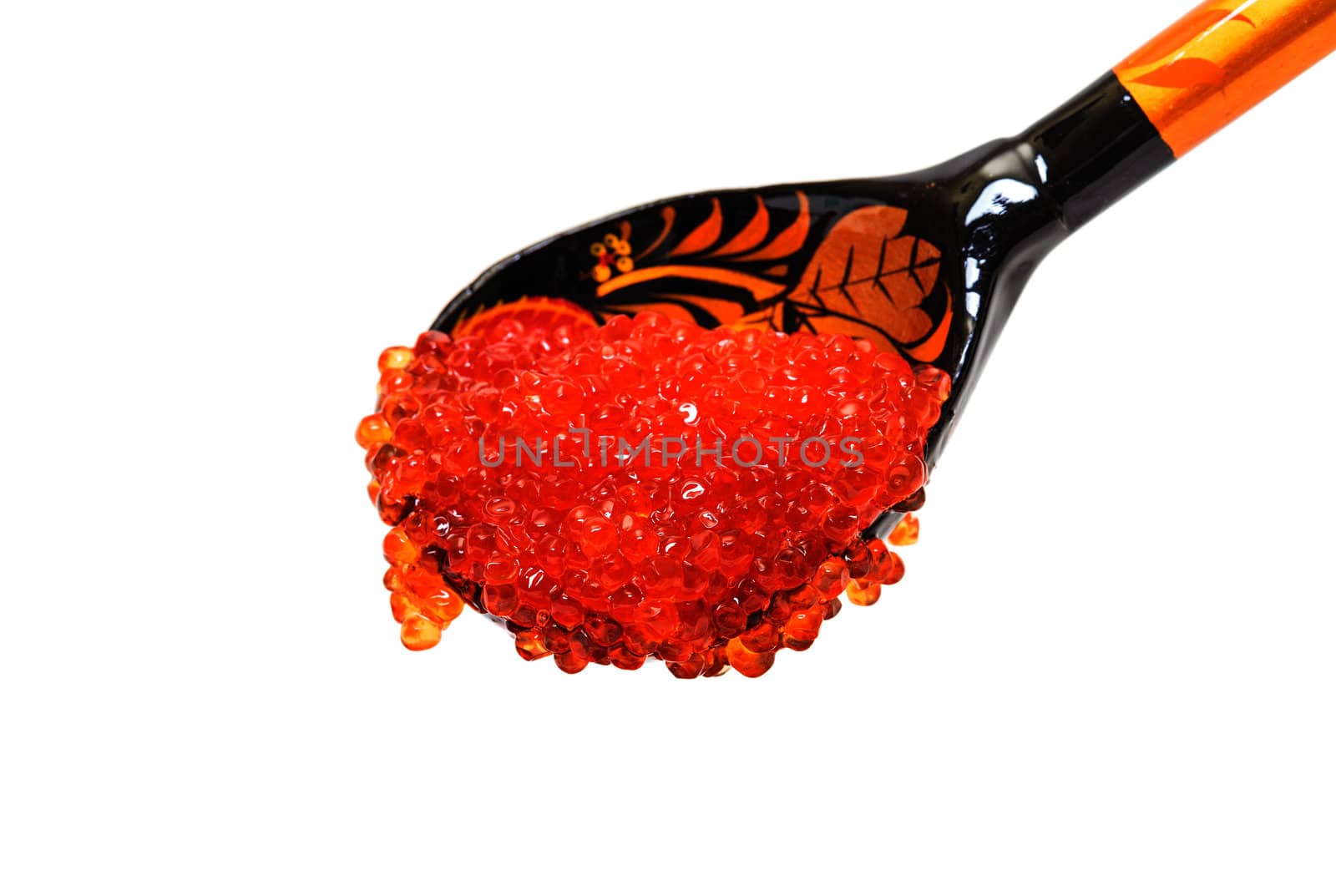 Red salted caviar with wooden spoon on a white background