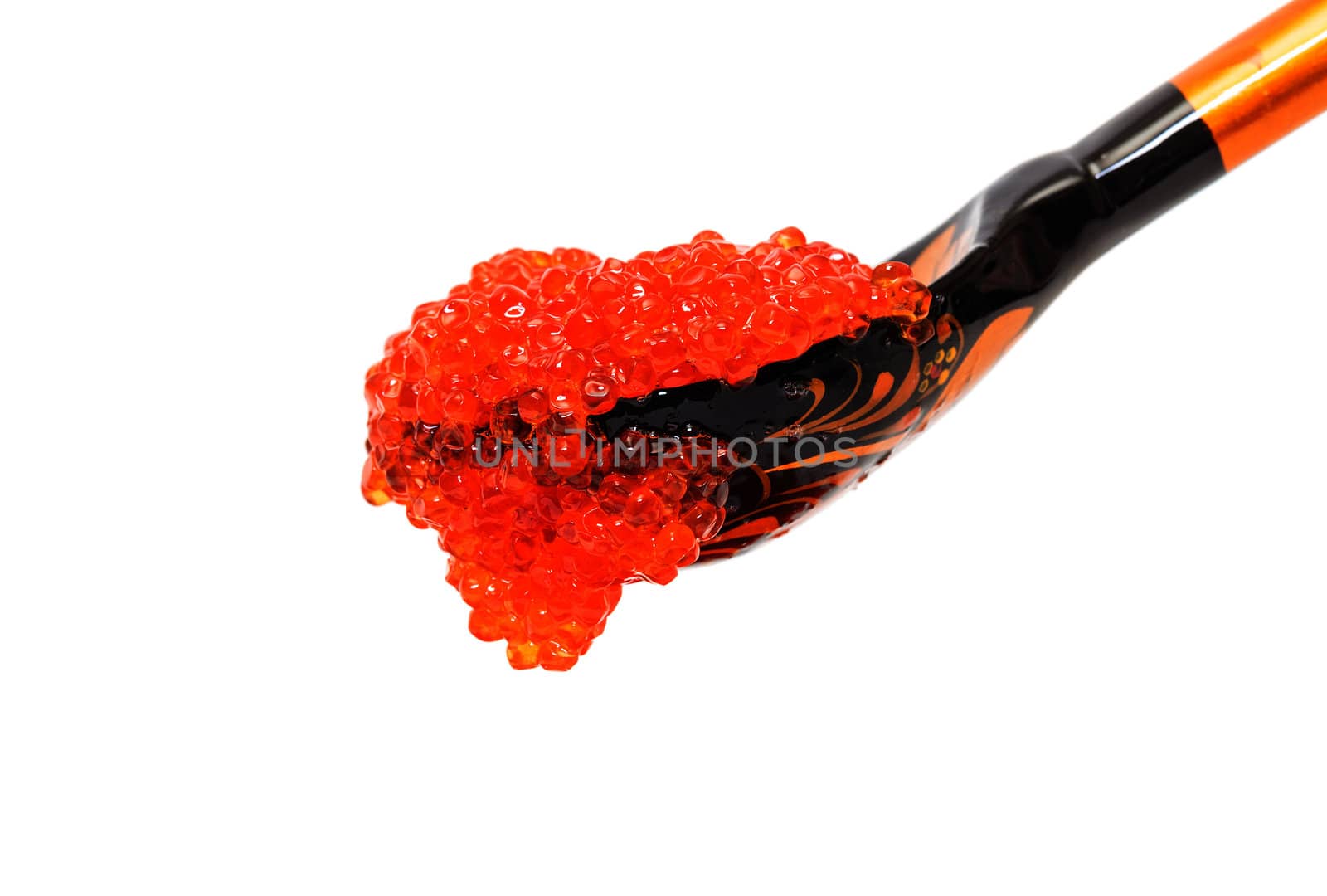 Red salted caviar with wooden spoon on a white background