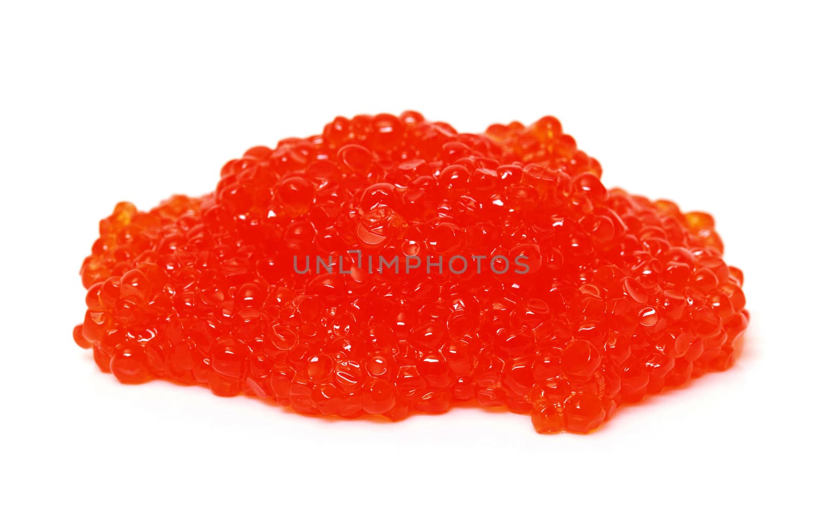 Red salted caviar, heap on a white background