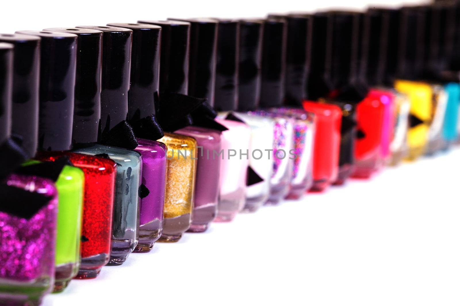 Group of bright nail polishes by Discovod