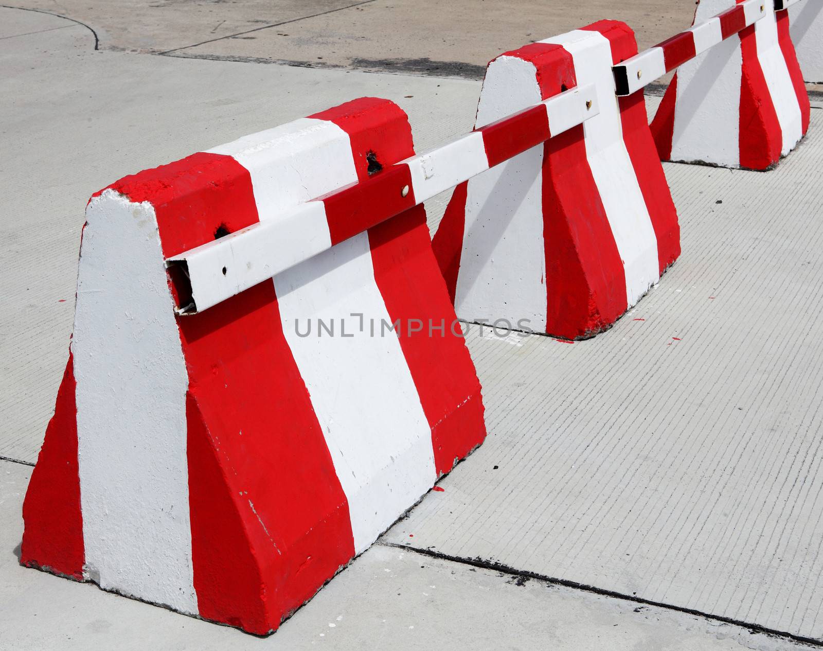 White and red color safety concrete barrier
