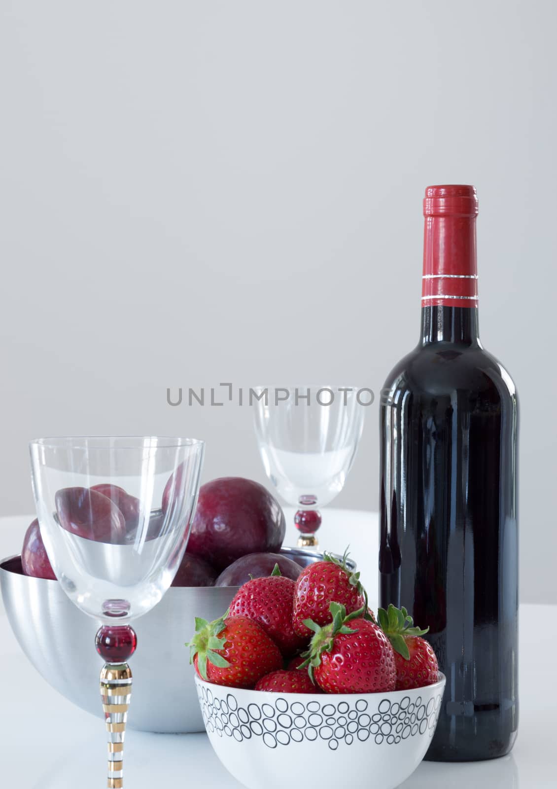 Red wine, plums and strawberries by anikasalsera