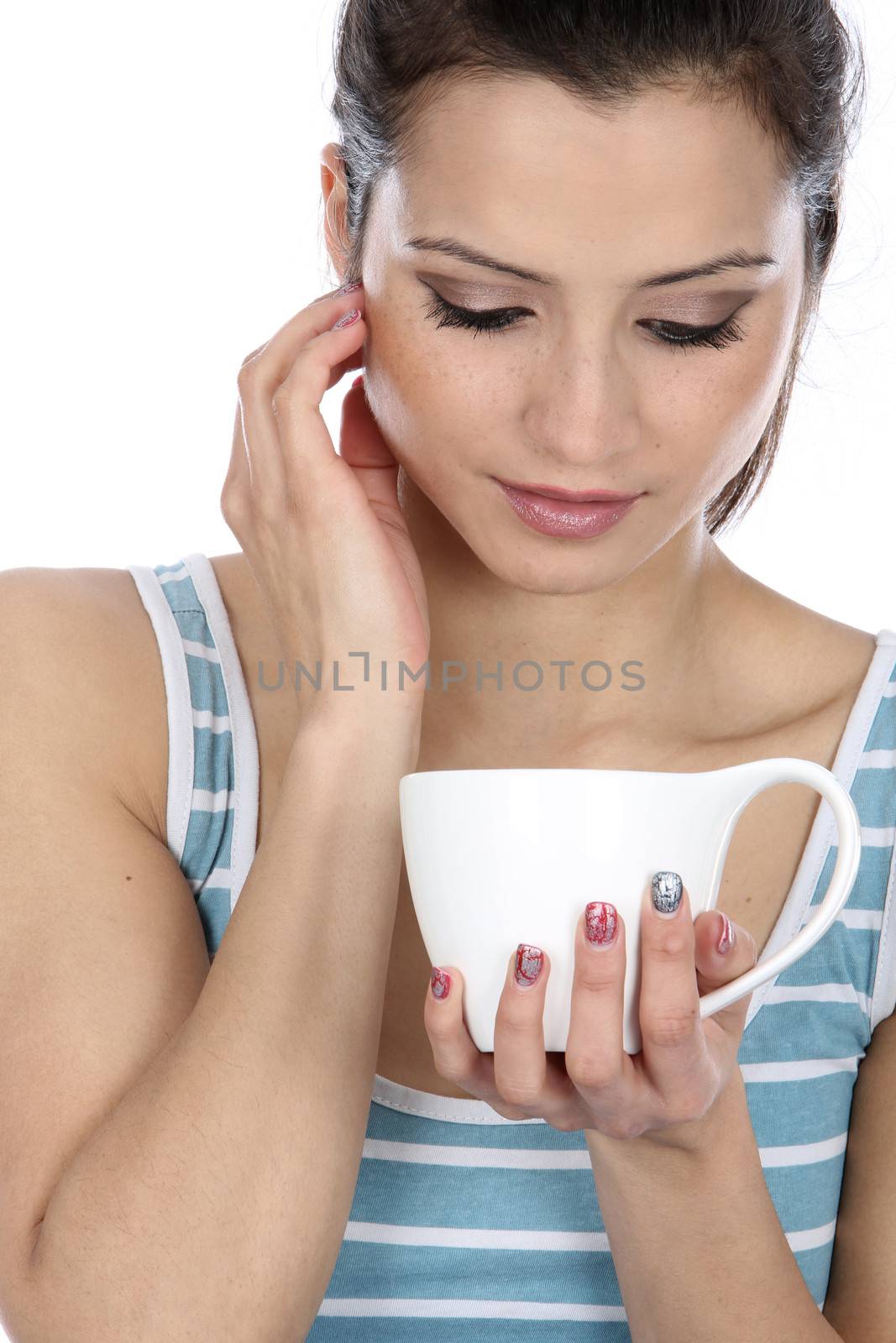 Model Released. Woman Drinking a Cup of Tea