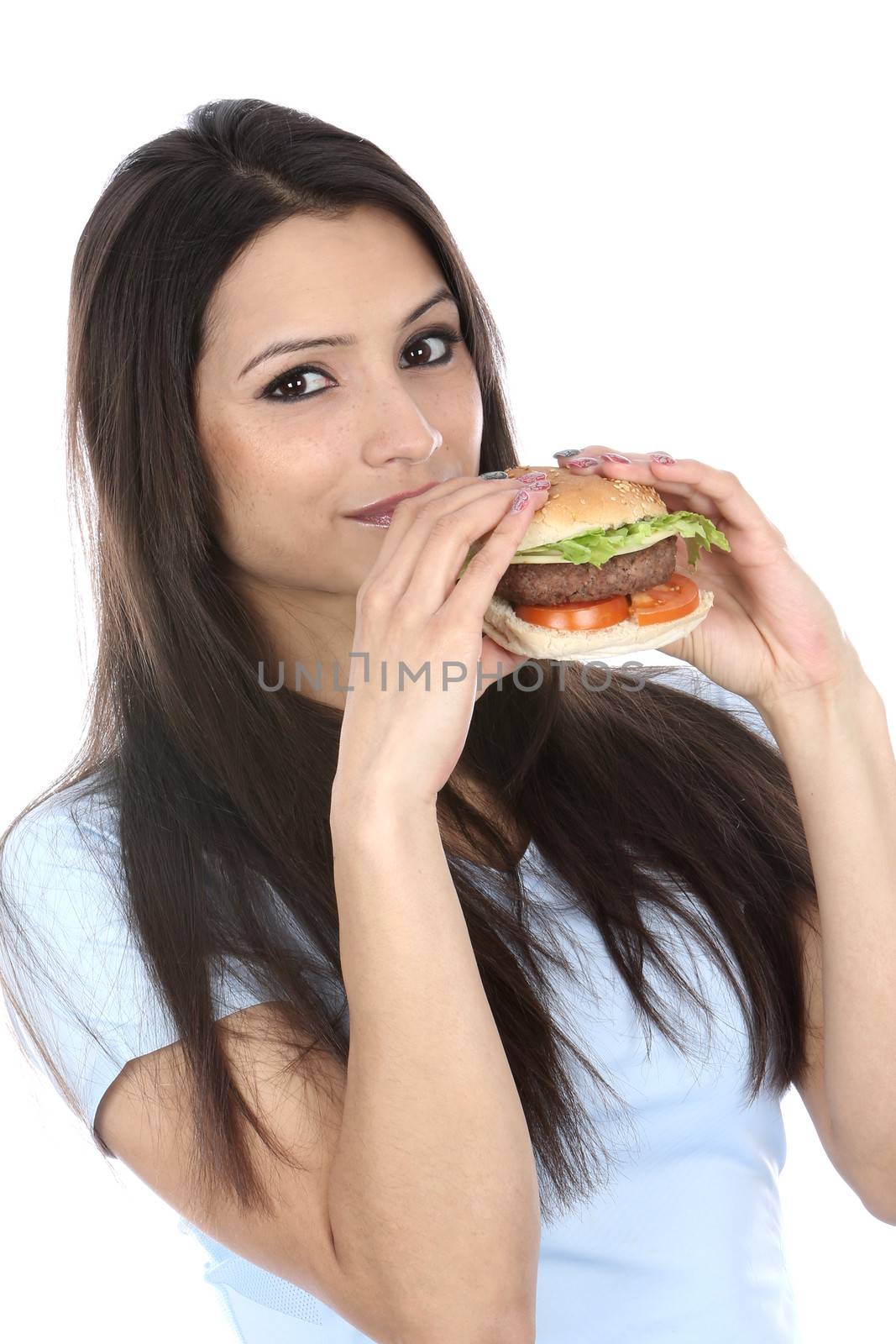 Model Released. Woman Eating Homemade Beefburger