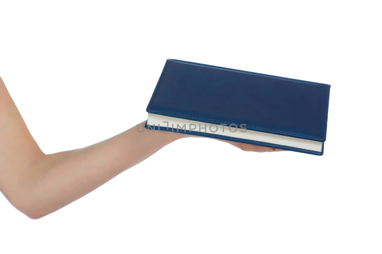A hand with a blue book on a white background